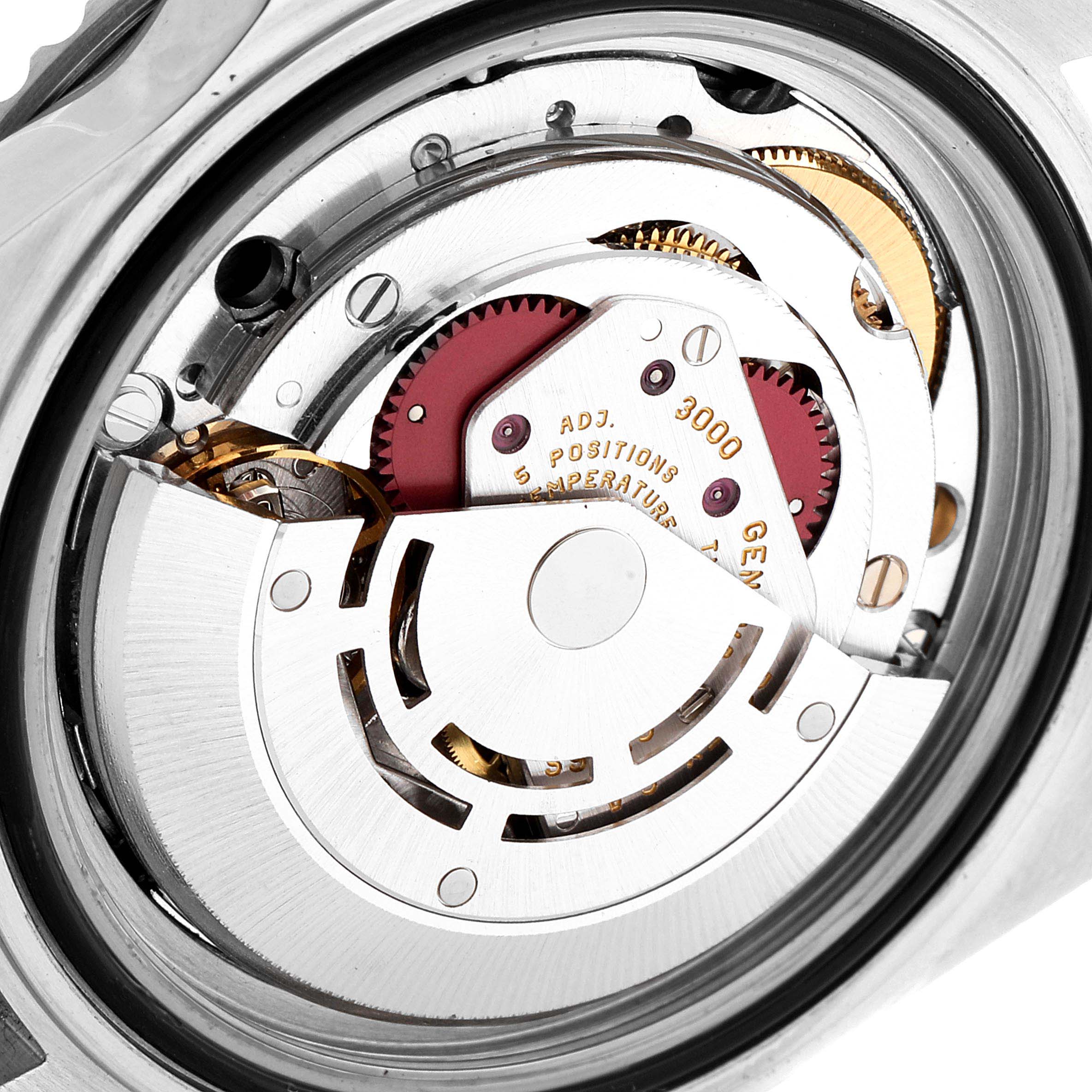 This image shows a close-up view of the movement mechanism of a Rolex Submariner 14060 Men
s Stainless Steel Black Dial 14060 Men
s Stainless Steel Black Dial watch.