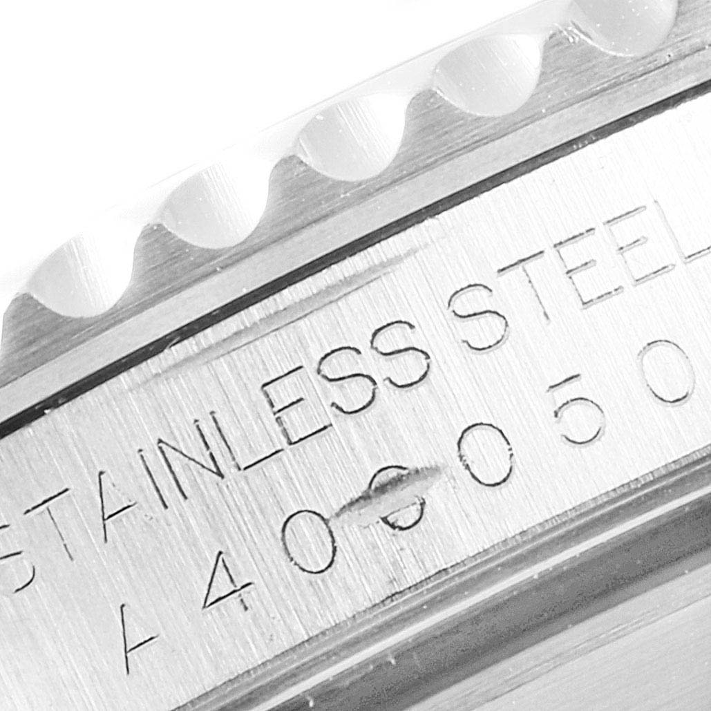 The image shows a close-up angle of the case side with engravings of a Rolex Submariner 14060 Men
s Stainless Steel Black Dial 14060 Men
s Stainless Steel Black Dial model watch.