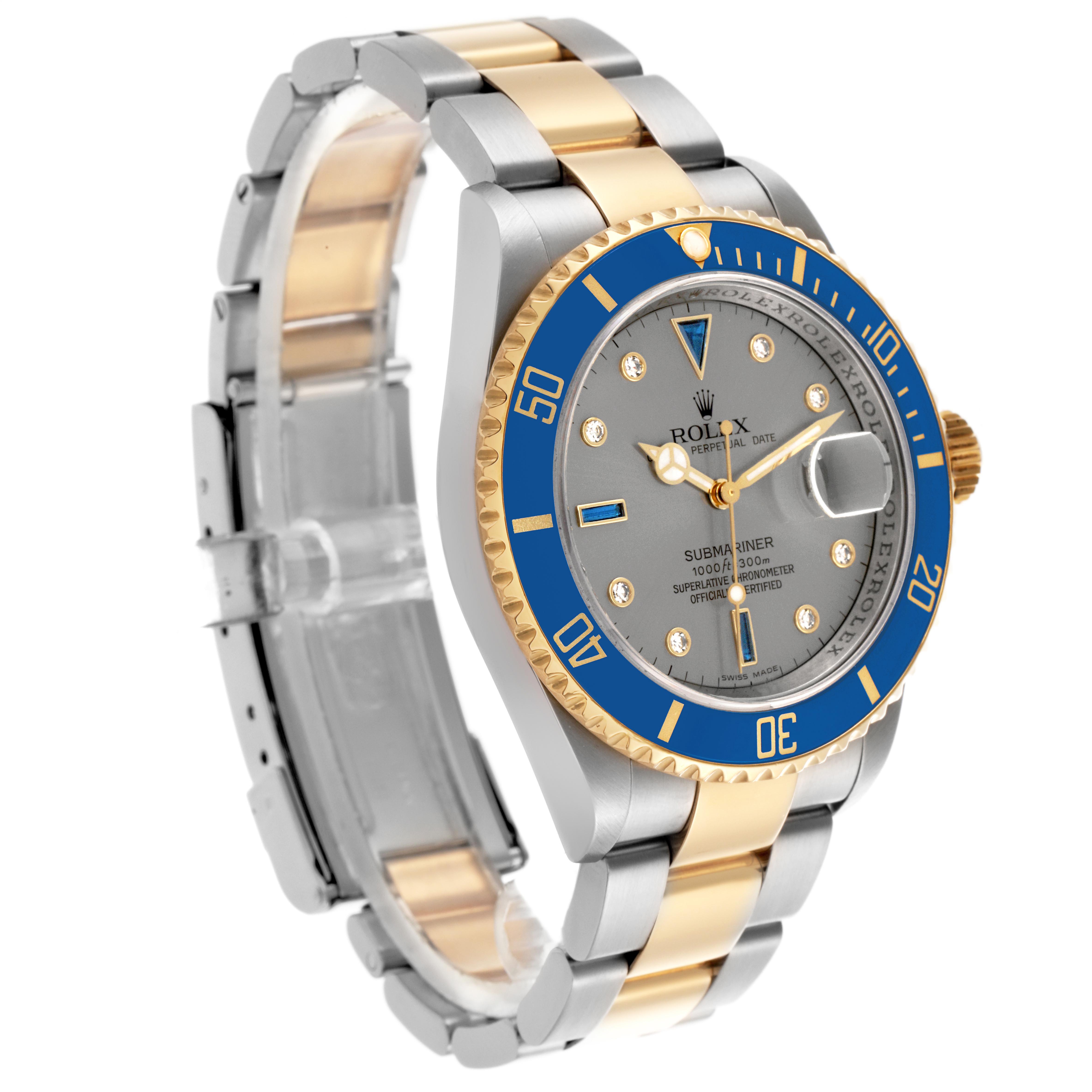 The Rolex Submariner 16613 Men
s Steel and Gold (two tone) Silver Dial 16613 Men
s Steel and Gold (two tone) Silver Dial model is shown at an angle highlighting the bezel, crown, and two-tone bracelet.