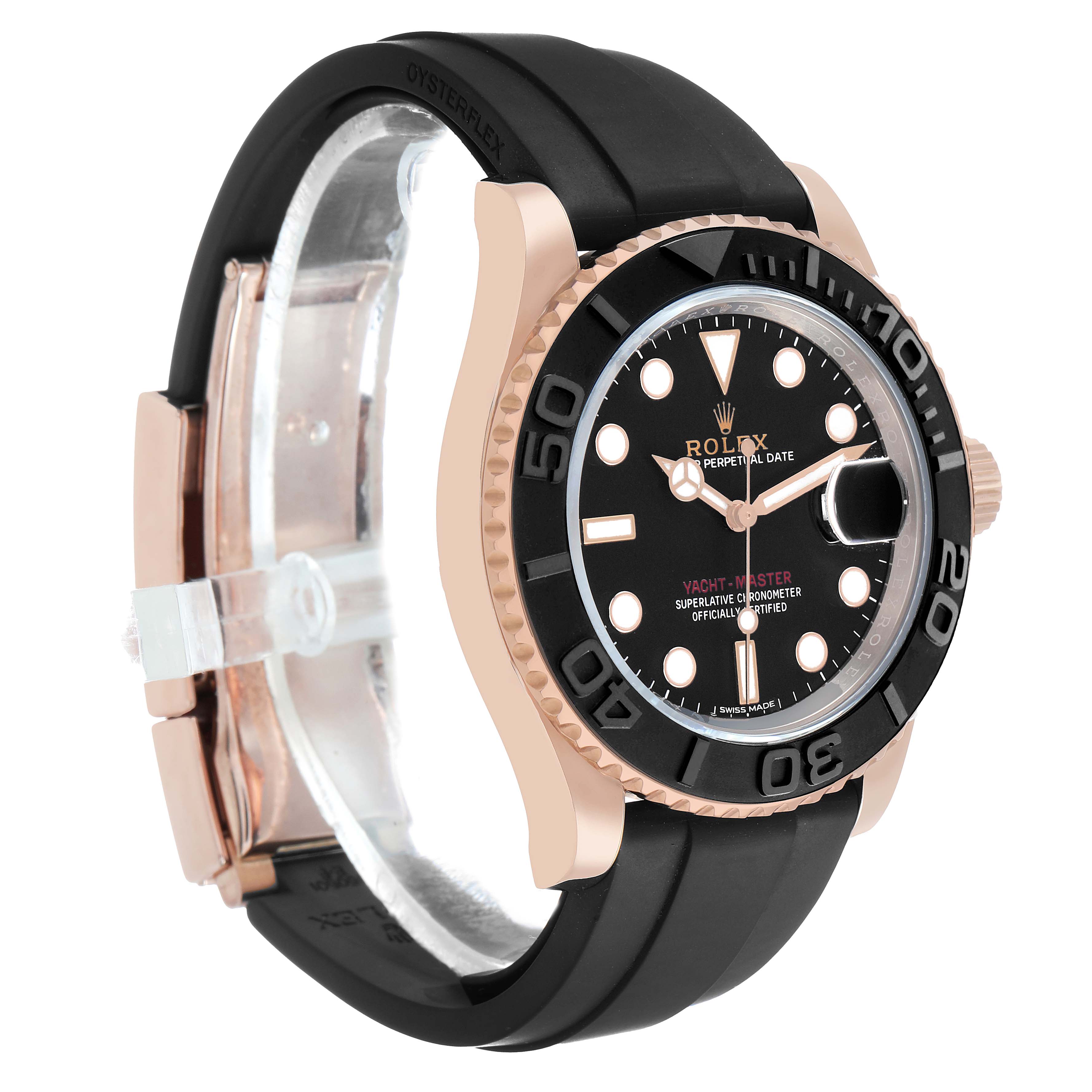 The Rolex Yacht-Master 116655 Men's Rose Gold Black Dial is shown at a three-quarter angle, highlighting the black dial, bezel, and rubber strap.