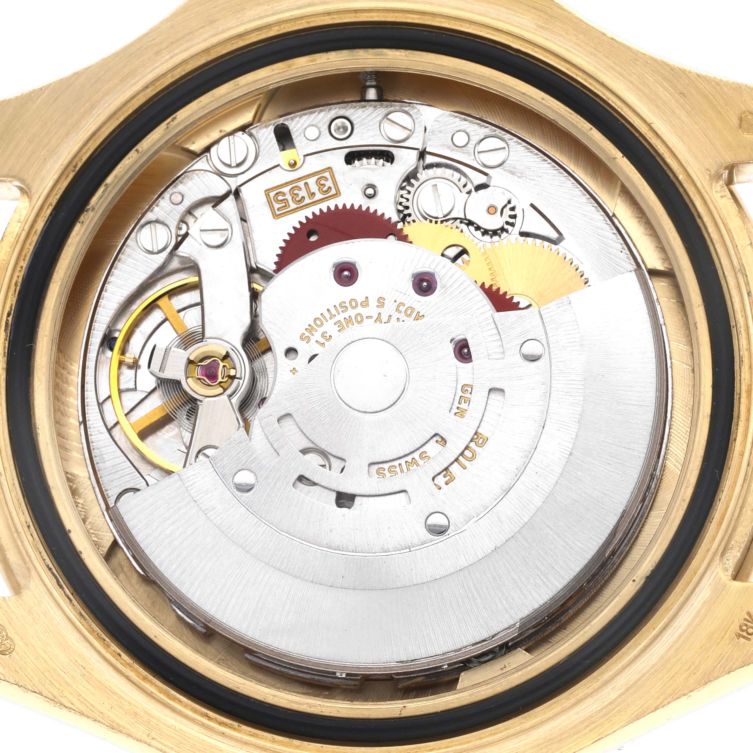 The image shows the movement of the Rolex Yacht-Master 16628 Men
s Yellow Gold Blue Dial 16628 Men
s Yellow Gold Blue Dial watch from a back angle, highlighting gears and the rotor.