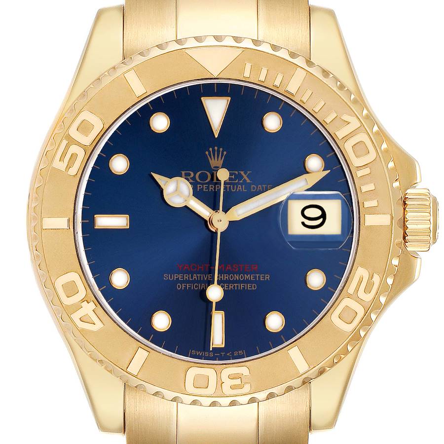 The Rolex Yacht-Master watch is shown from a top-down angle, displaying the blue dial, gold bezel, and crown.