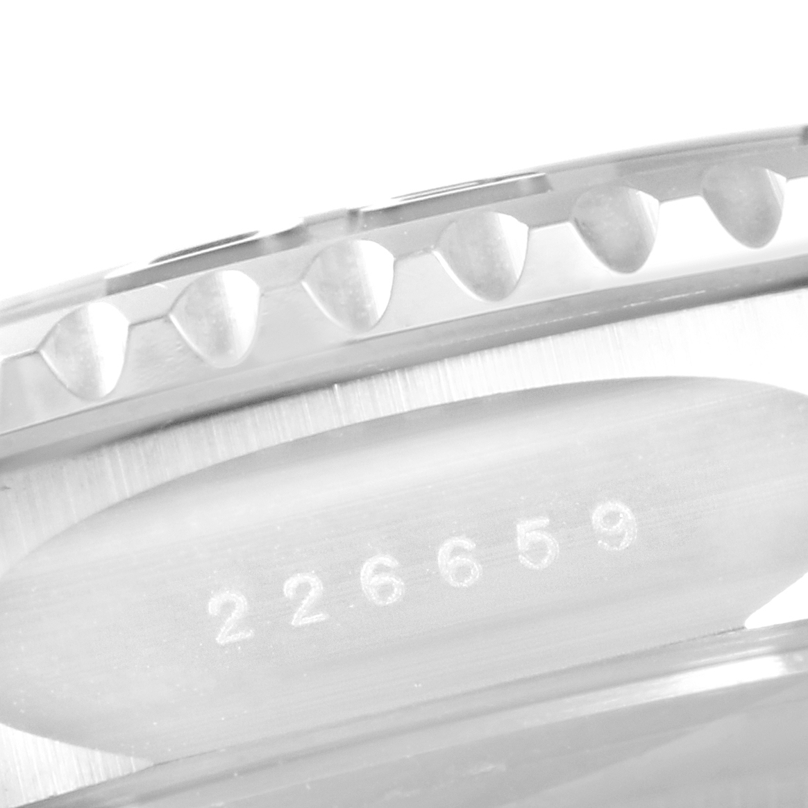 The image shows a close-up of the side of a Rolex Yacht-Master 226659 Men's White Gold Black Dial 226659 Men's White Gold Black Dial watch, highlighting the bezel and serial number 226659.
