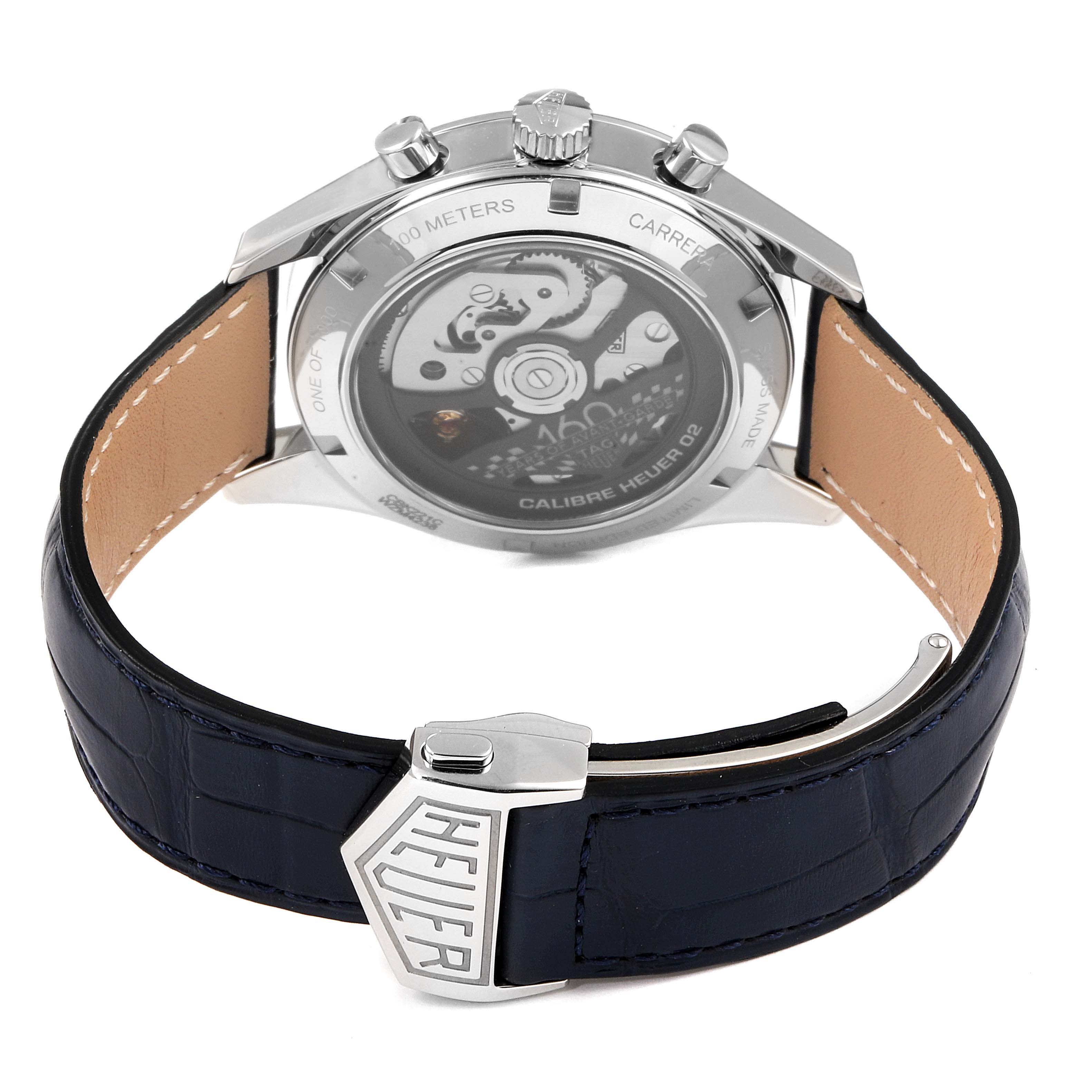 The image shows the back view of a Tag Heuer Carrera CBK221C.FC6488 Men's Stainless Steel White Dial CBK221C.FC6488 Men's Stainless Steel White Dial watch, displaying its movement and leather strap with clasp.