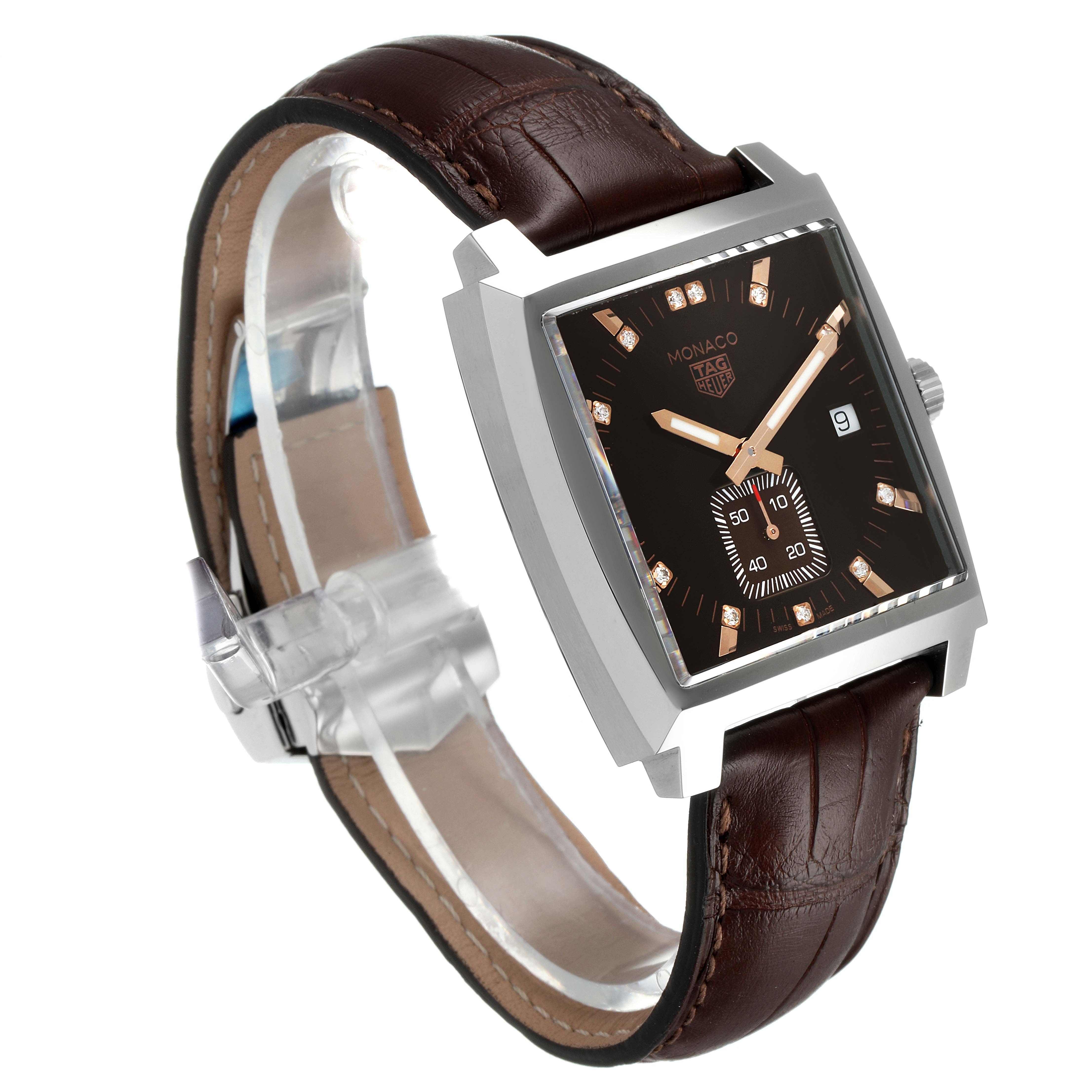 The Tag Heuer Monaco WAW131E.FC6420 Men's Stainless Steel Brown Dial WAW131E.FC6420 Men's Stainless Steel Brown Dial watch is shown at an angle highlighting its face, brown leather strap, and crown on the right side.