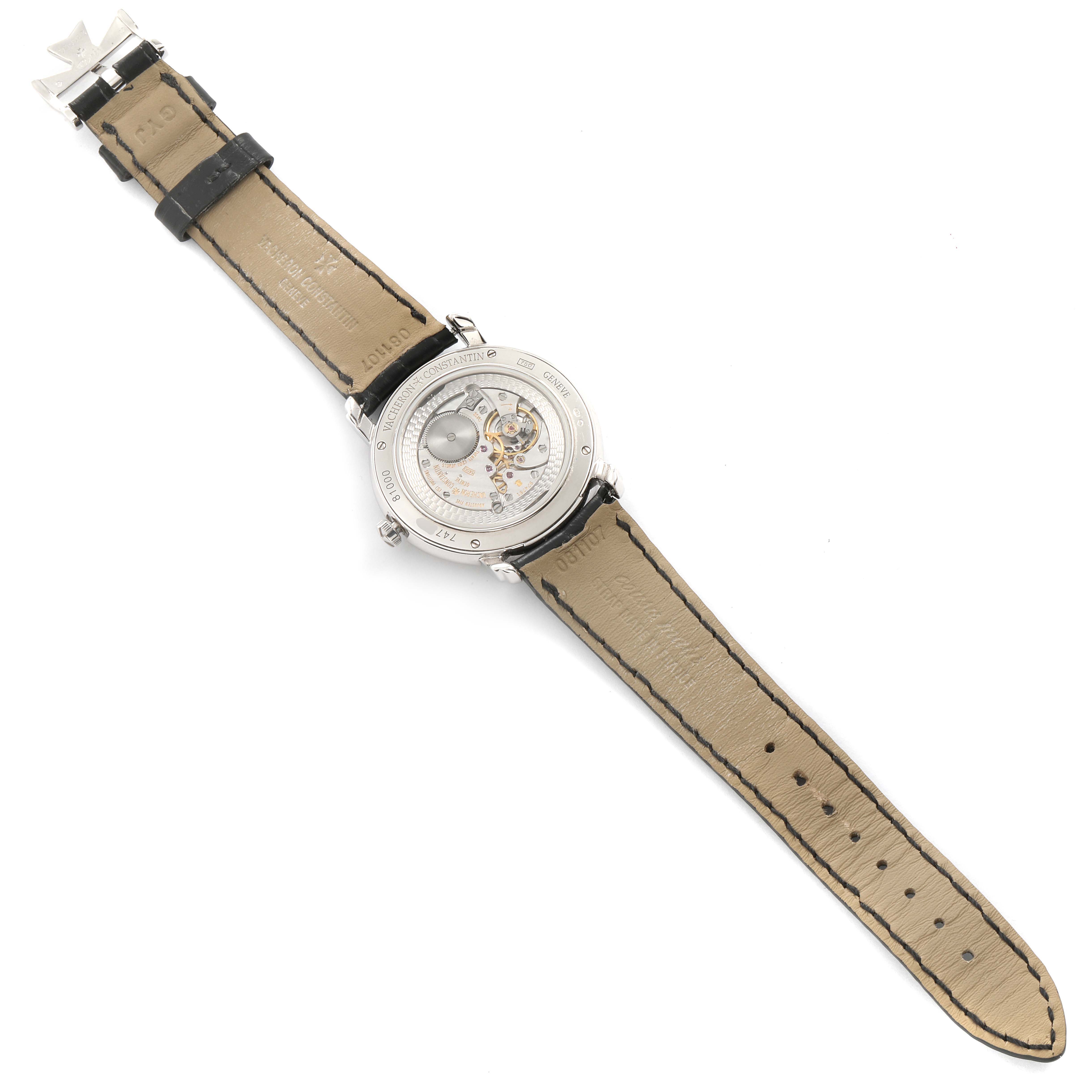 The image shows the back view of a Vacheron Constantin Malte 81000/000G-9107 Men's White Gold Silver Dial 81000/000G-9107 Men's White Gold Silver Dial watch, displaying its internal mechanism and leather strap.