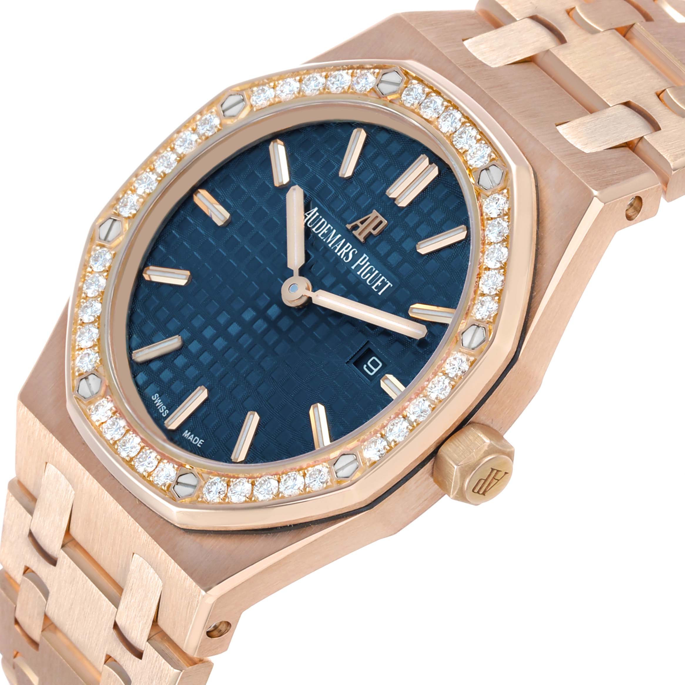 The Audemars Piguet Royal Oak 67651OR.ZZ.1261OR.02 Women's Rose Gold Blue Dial model is shown at a slight angle, highlighting its diamond-set bezel, blue dial, and gold bracelet.