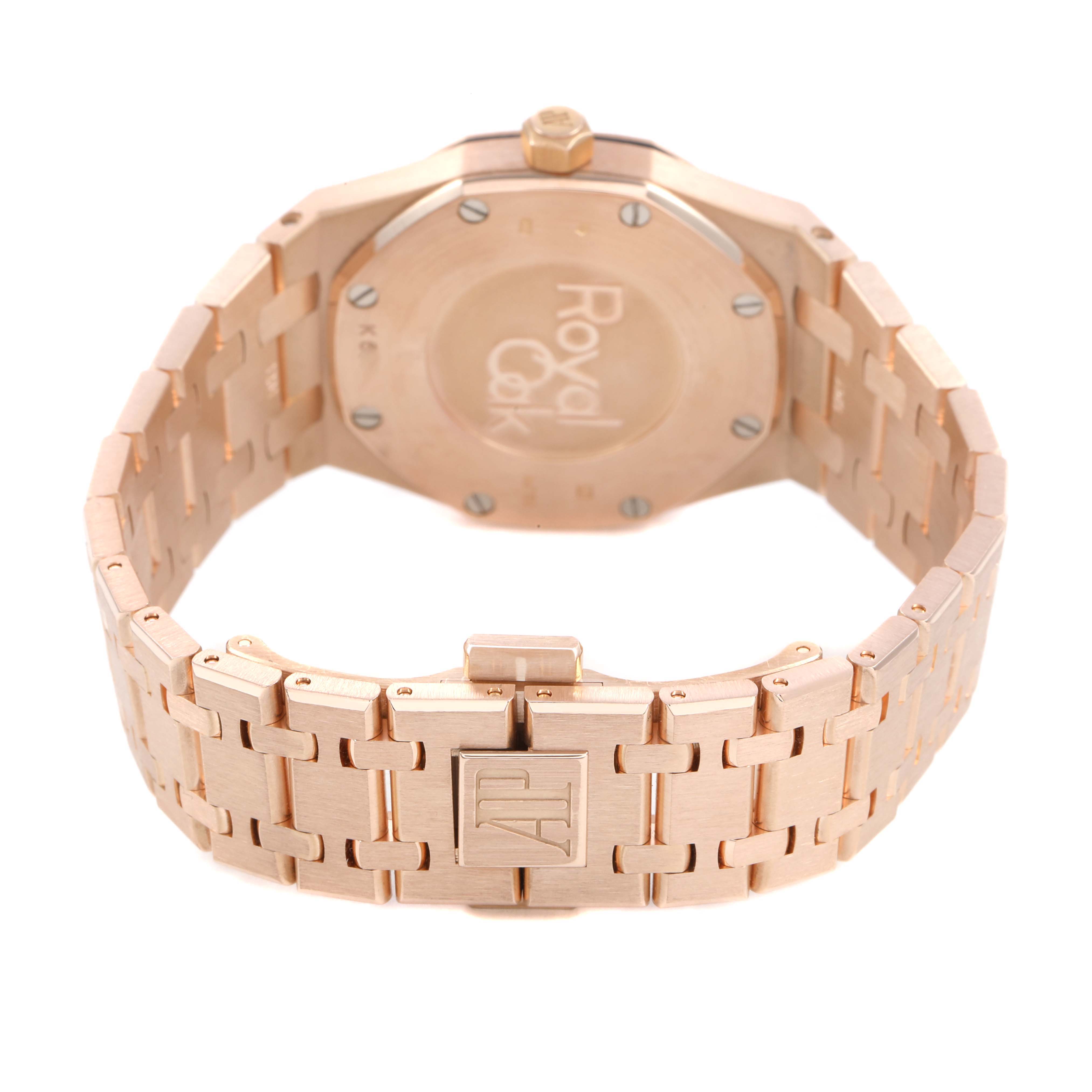 The image shows the back and clasp of the Audemars Piguet Royal Oak 67651OR.ZZ.1261OR.02 Women's Rose Gold Blue Dial, highlighting its bracelet and engraved logo.