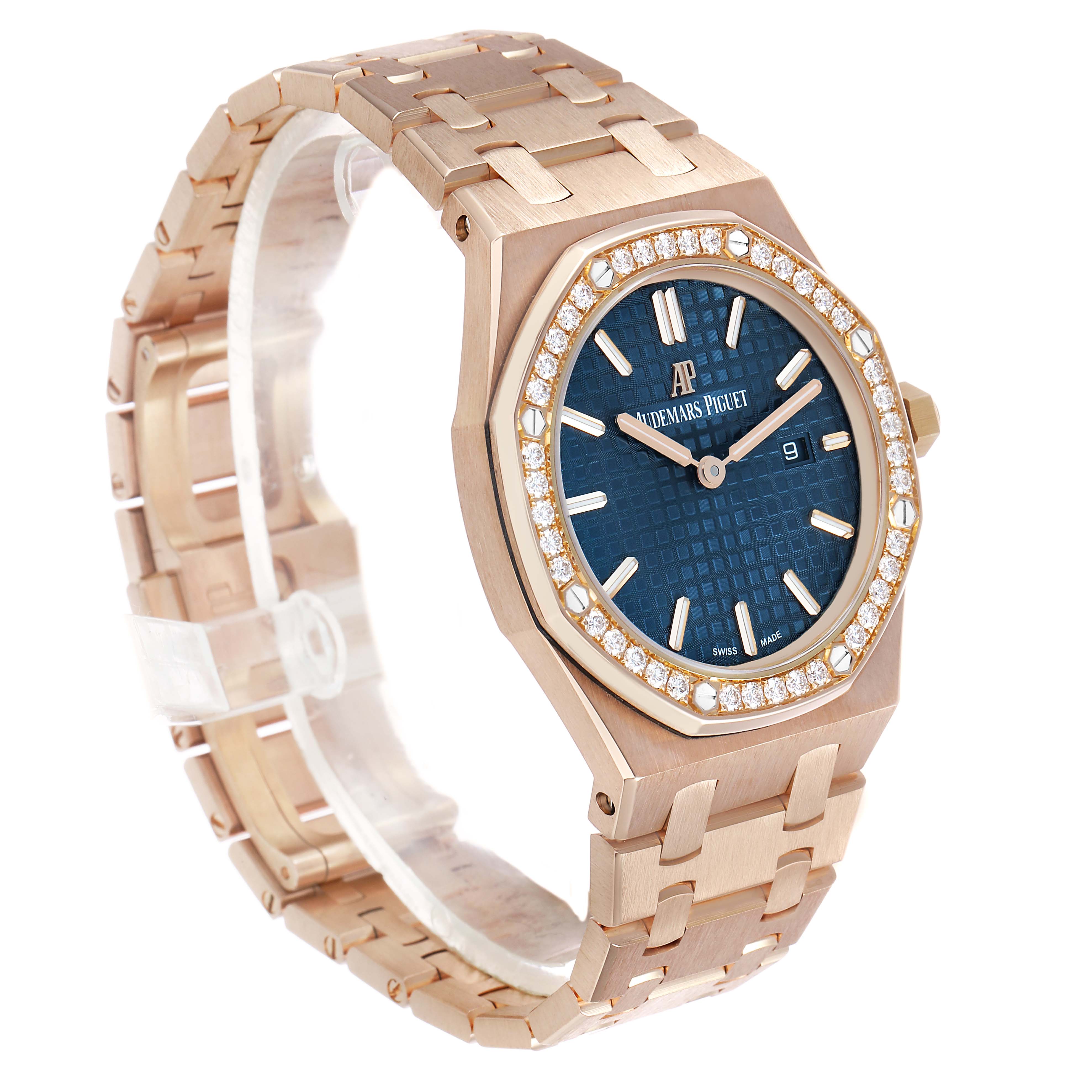The Audemars Piguet Royal Oak 67651OR.ZZ.1261OR.02 Women's Rose Gold Blue Dial watch is shown in a three-quarter view, highlighting the bezel, blue dial, and bracelet.