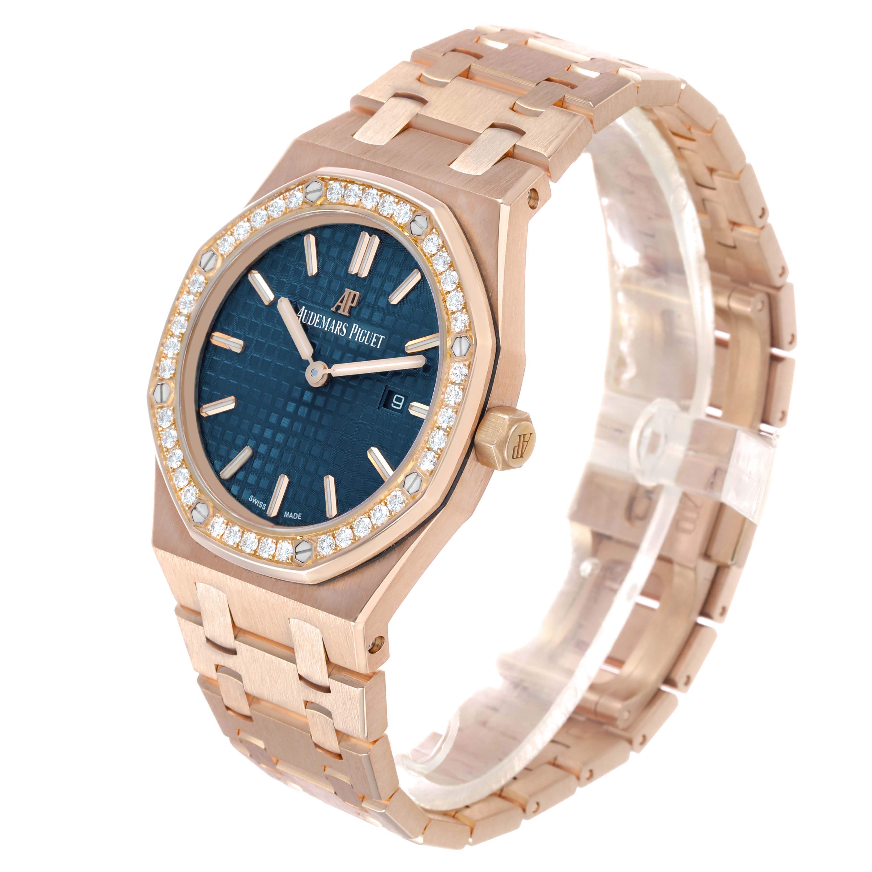 The Audemars Piguet Royal Oak 67651OR.ZZ.1261OR.02 Women's Rose Gold Blue Dial watch is shown at a three-quarter angle, highlighting the face, bezel, crown, and bracelet.