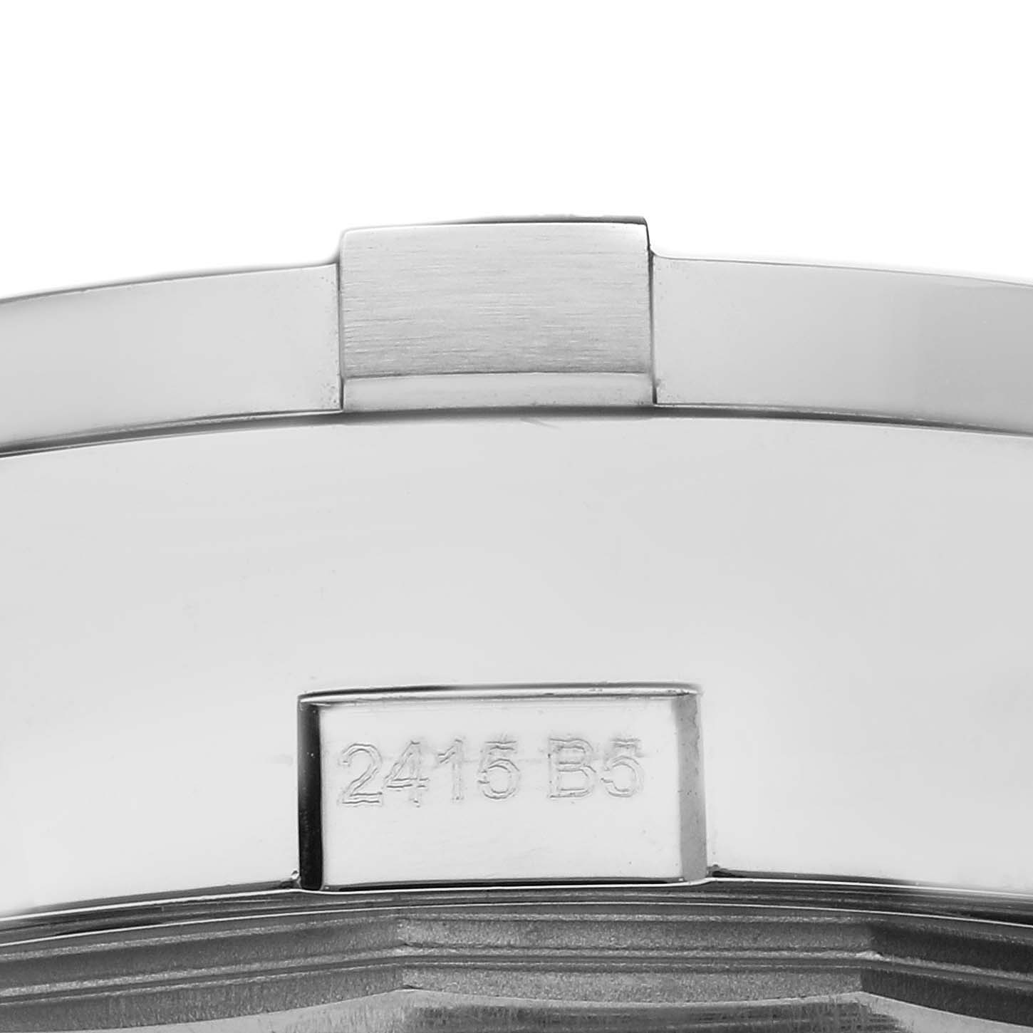 The image shows a close-up of the clasp of a Breitling Avenger A13381 Men
s Stainless Steel Black Dial A13381 Men
s Stainless Steel Black Dial watch, featuring a brushed metal finish and the engraved serial "2415 B5."