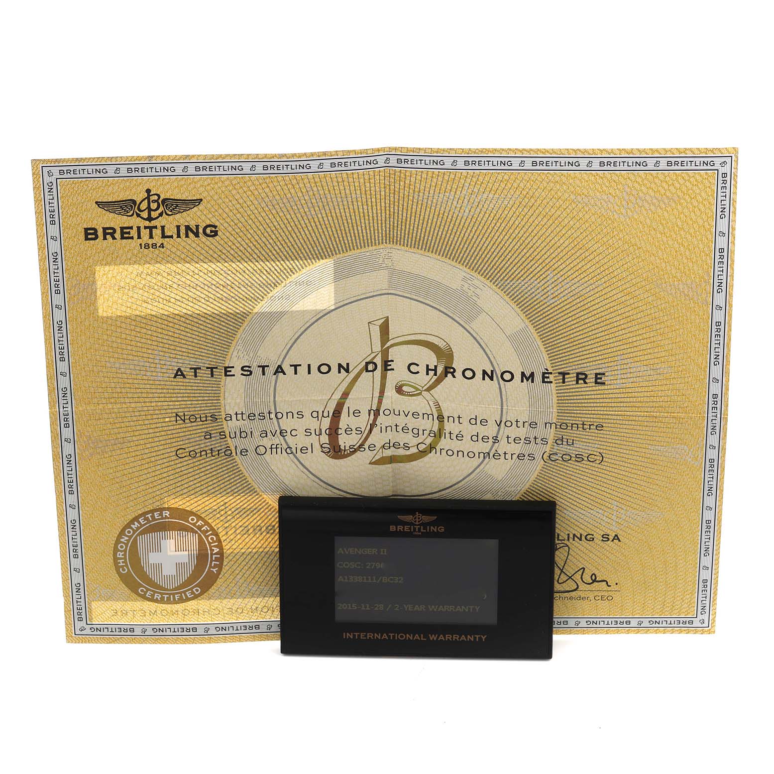 The image shows the Breitling Avenger A13381 Men
s Stainless Steel Black Dial A13381 Men
s Stainless Steel Black Dial model
s chronometer certificate and international warranty card.