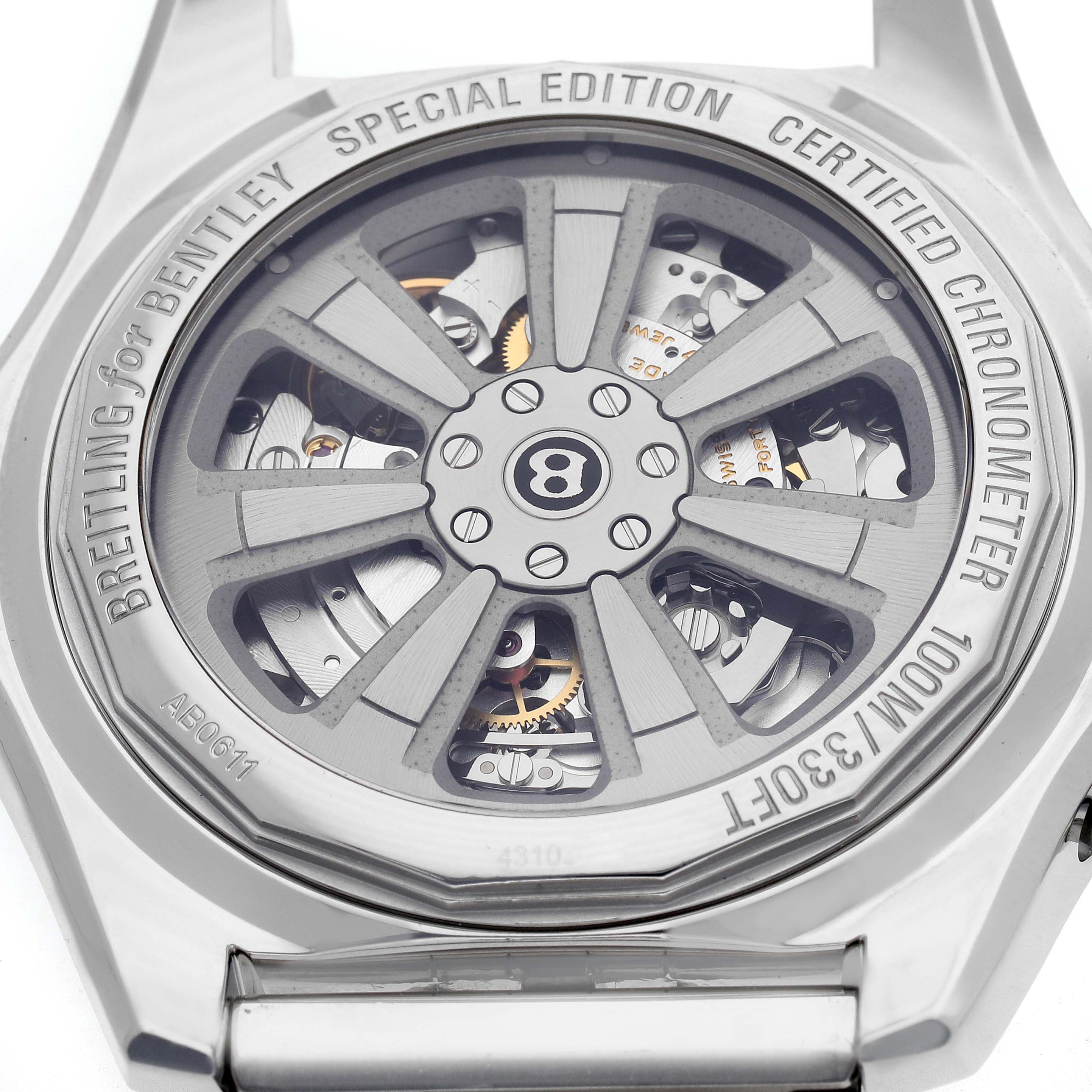 The image shows the case back of a Breitling for Bentley watch, revealing the movement through a transparent window.