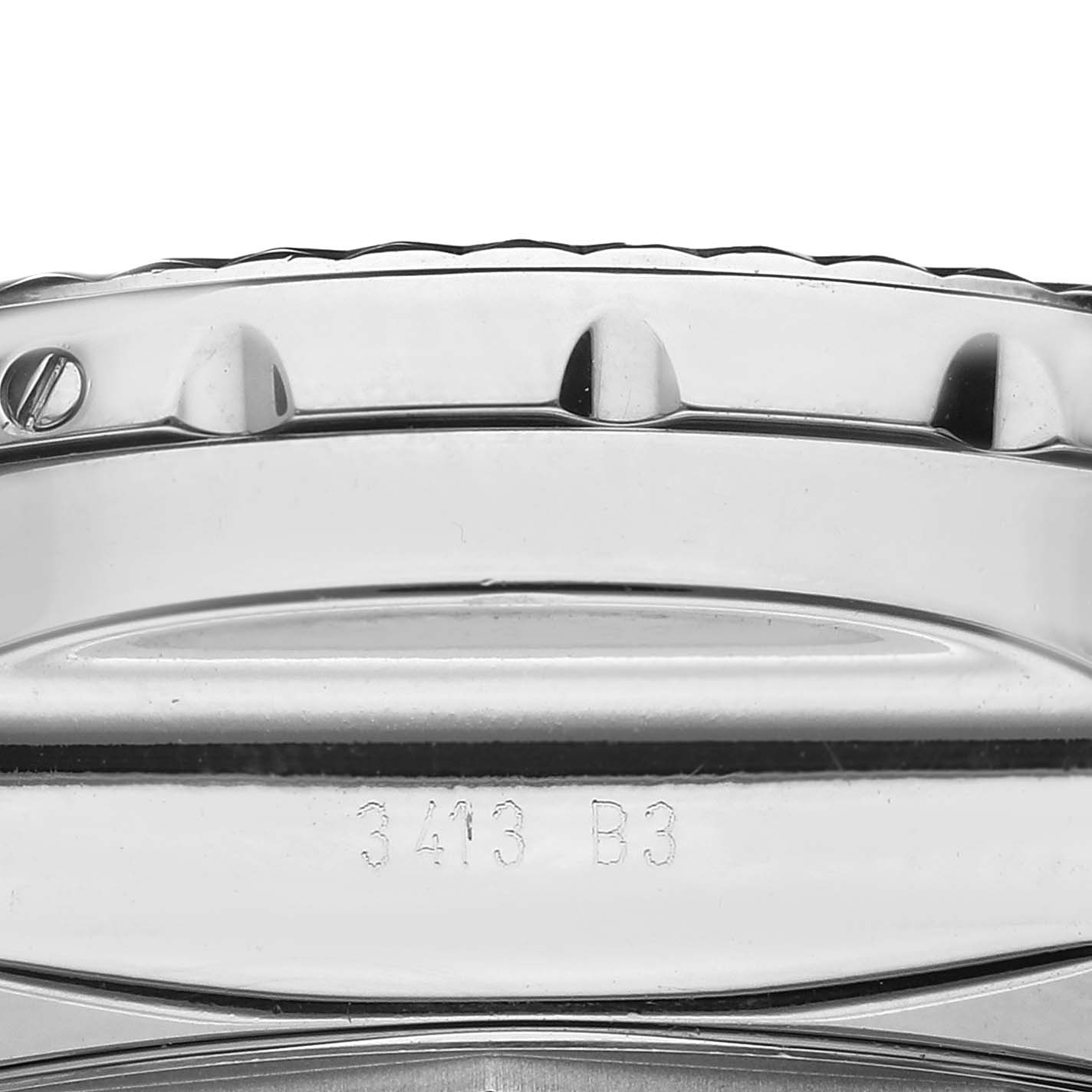 The image shows a close-up side view of the bezel and part of the case of a Breitling Bentley AB0611 Men
s Stainless Steel Black Dial AB0611 Men
s Stainless Steel Black Dial watch, featuring screws and engravings.