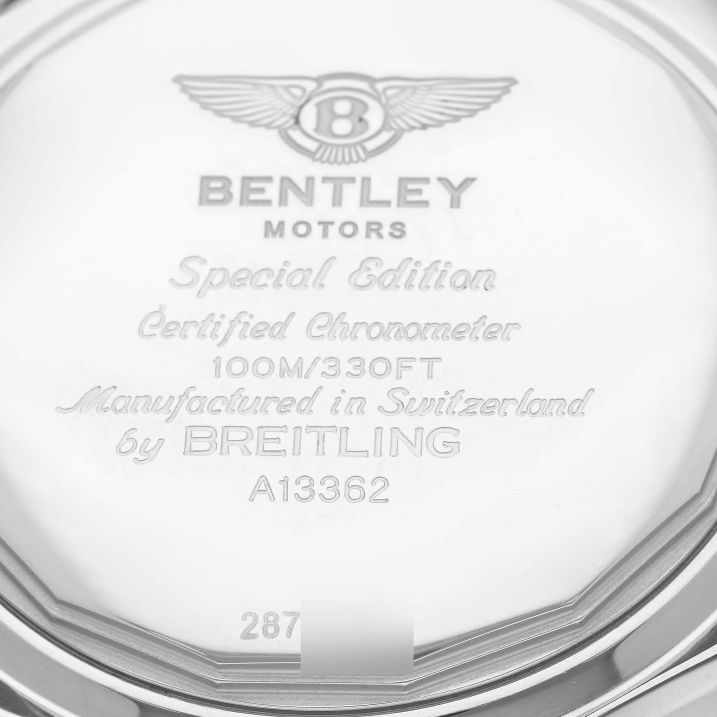 The image shows the engraved back case of a Breitling Bentley A13362 Men's Stainless Steel Mother of Pearl Dial A13362 Men's Stainless Steel Mother of Pearl Dial model watch, highlighting brand details and specifications.