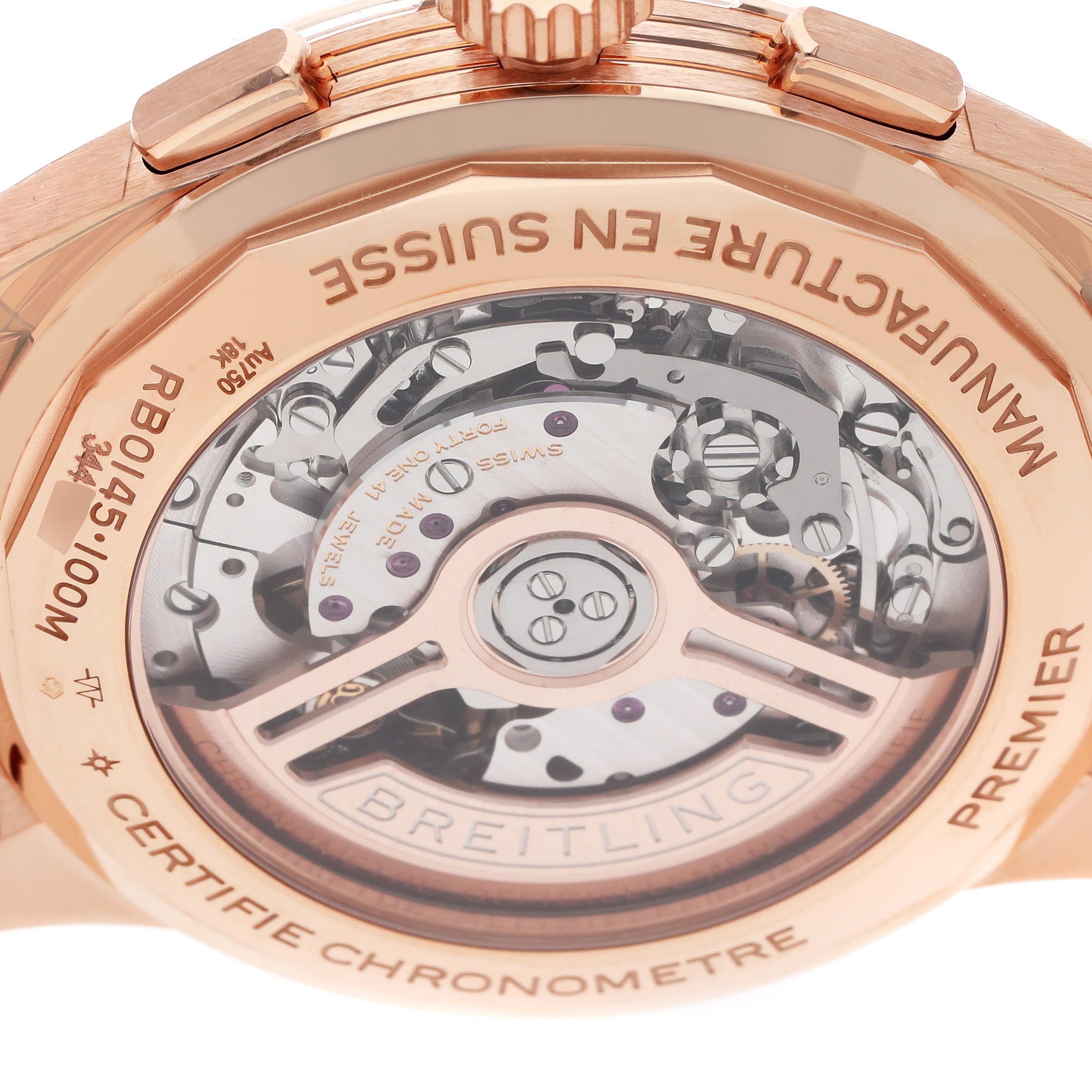 The image shows the back of a Breitling Premier RB0145 Men
s Rose Gold Silver Dial RB0145 Men
s Rose Gold Silver Dial watch, highlighting its movement through a transparent case.