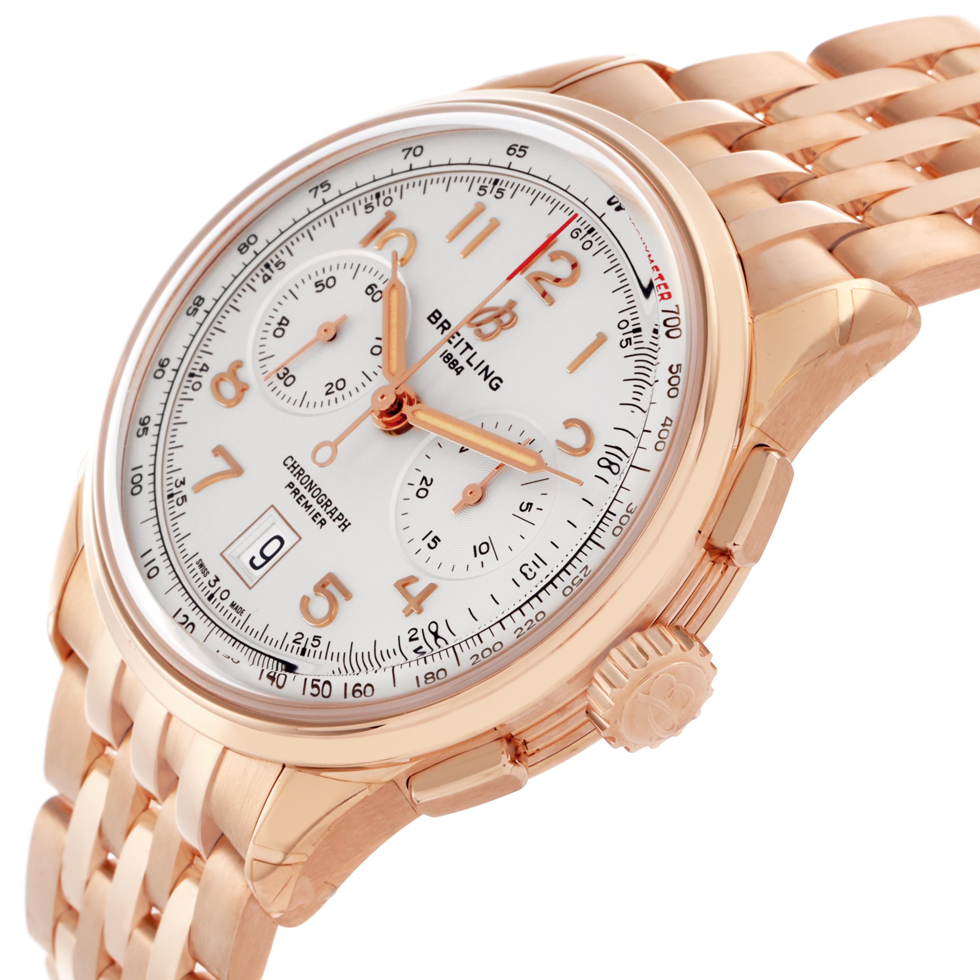 The Breitling Premier RB0145 Men
s Rose Gold Silver Dial RB0145 Men
s Rose Gold Silver Dial watch is shown at a three-quarter angle displaying the dial, crown, bezel, pushers, and bracelet.