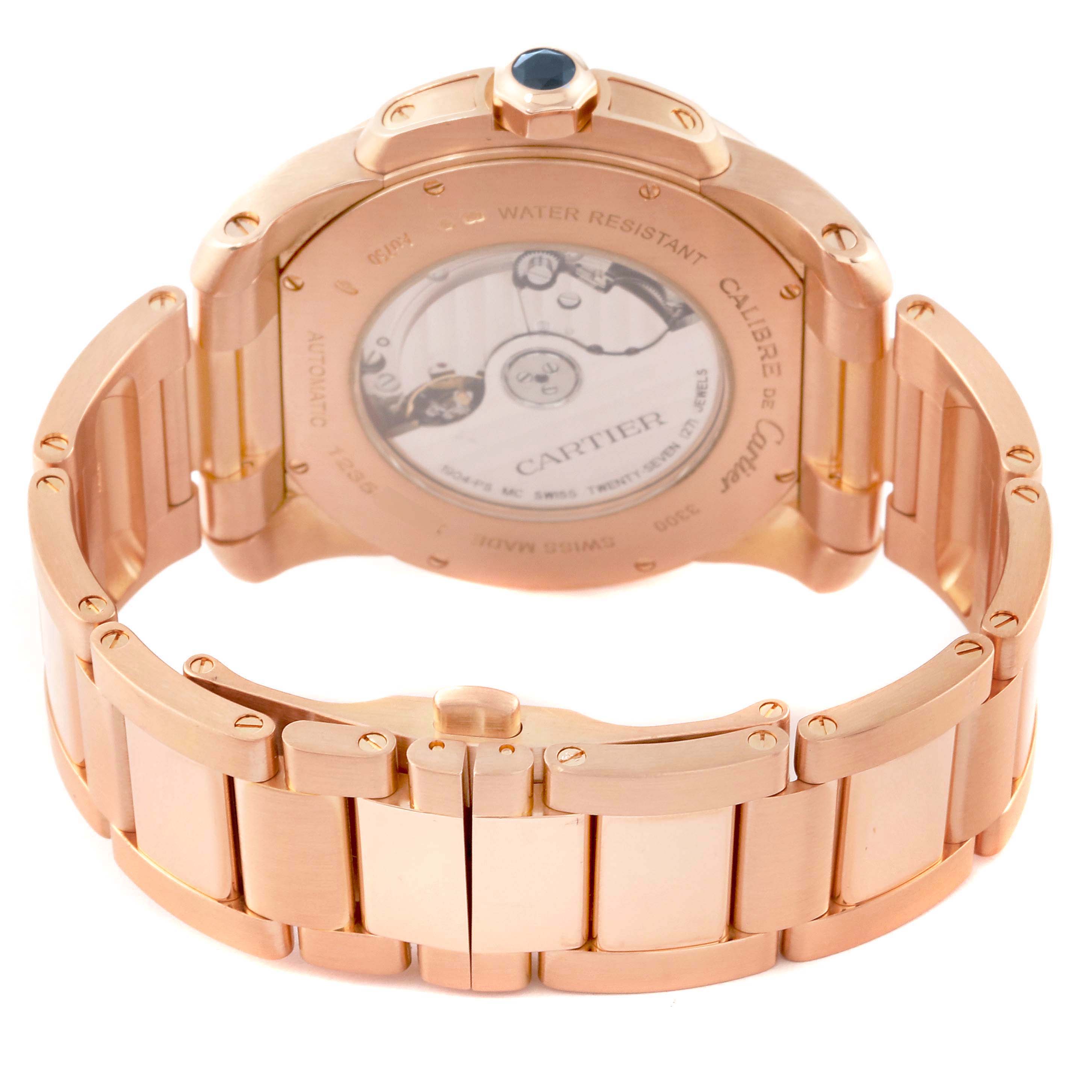 The image shows the back case and bracelet of a Calibre de Cartier watch by Cartier, highlighting the transparent case back and rose gold bracelet.
