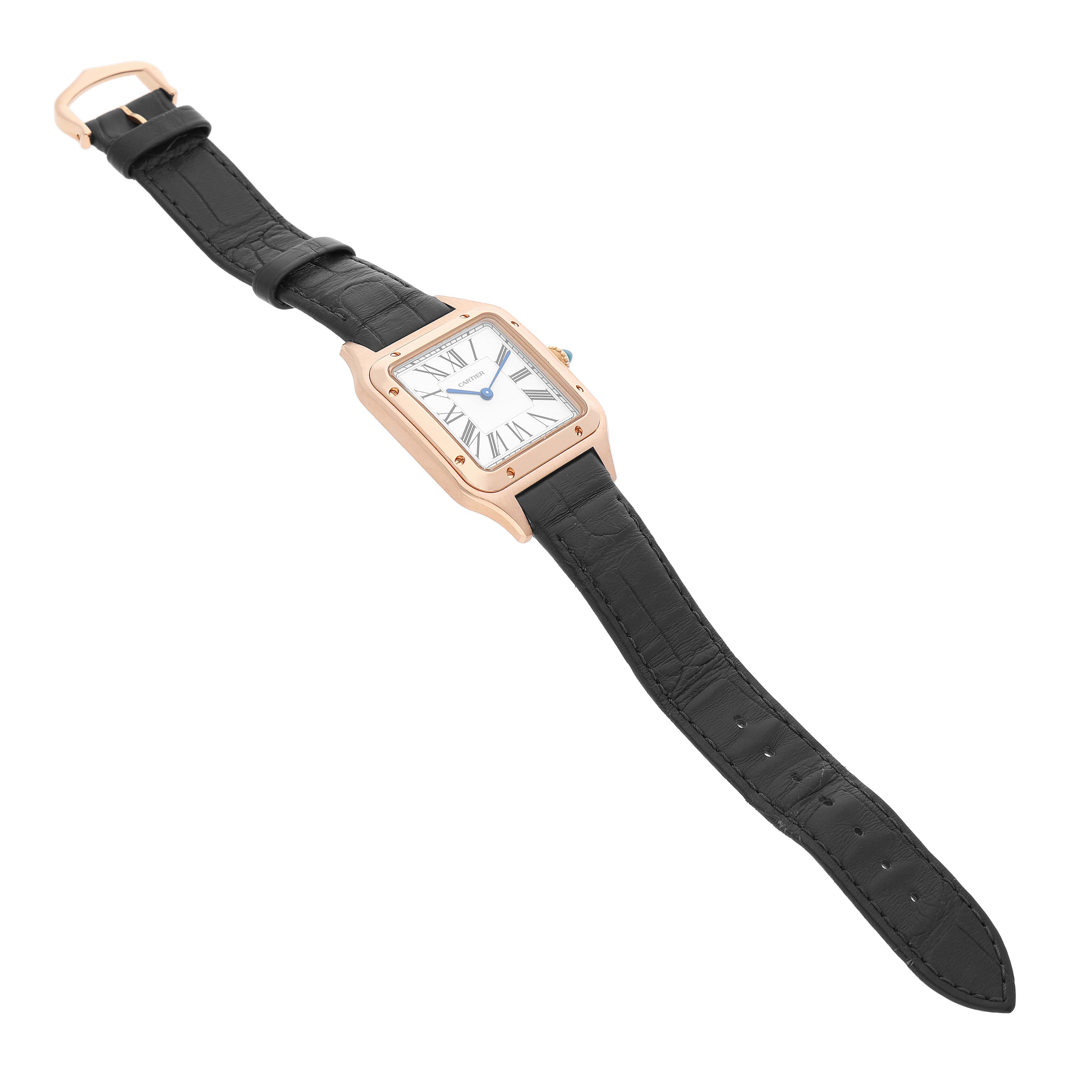 The Cartier Santos Dumont WGSA0021 Men's Rose Gold Silver Dial watch is shown at a three-quarter angle, displaying its face, case, and black leather strap.