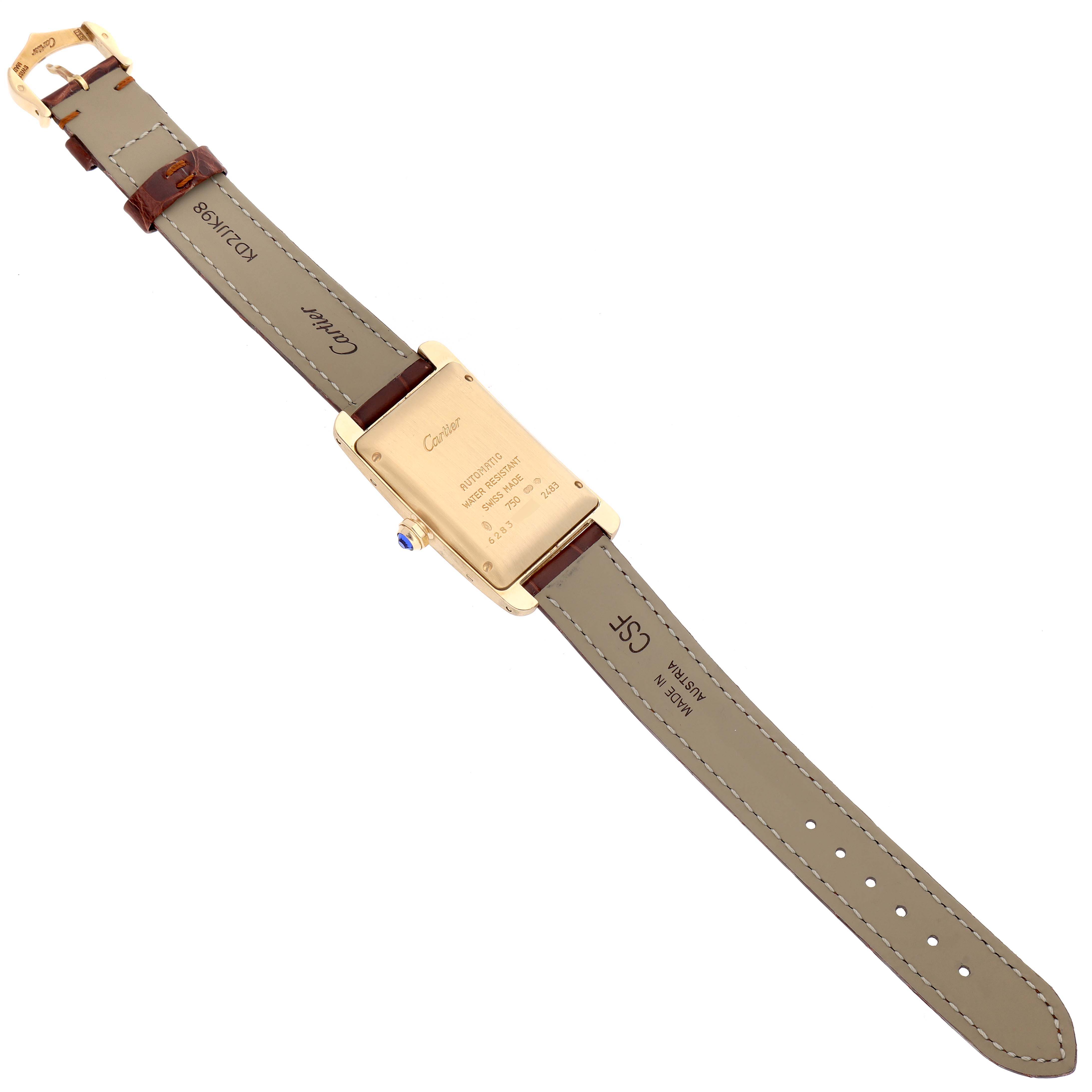 This image shows the back view of a Tank Americaine model by Cartier, highlighting the strap and case back details.