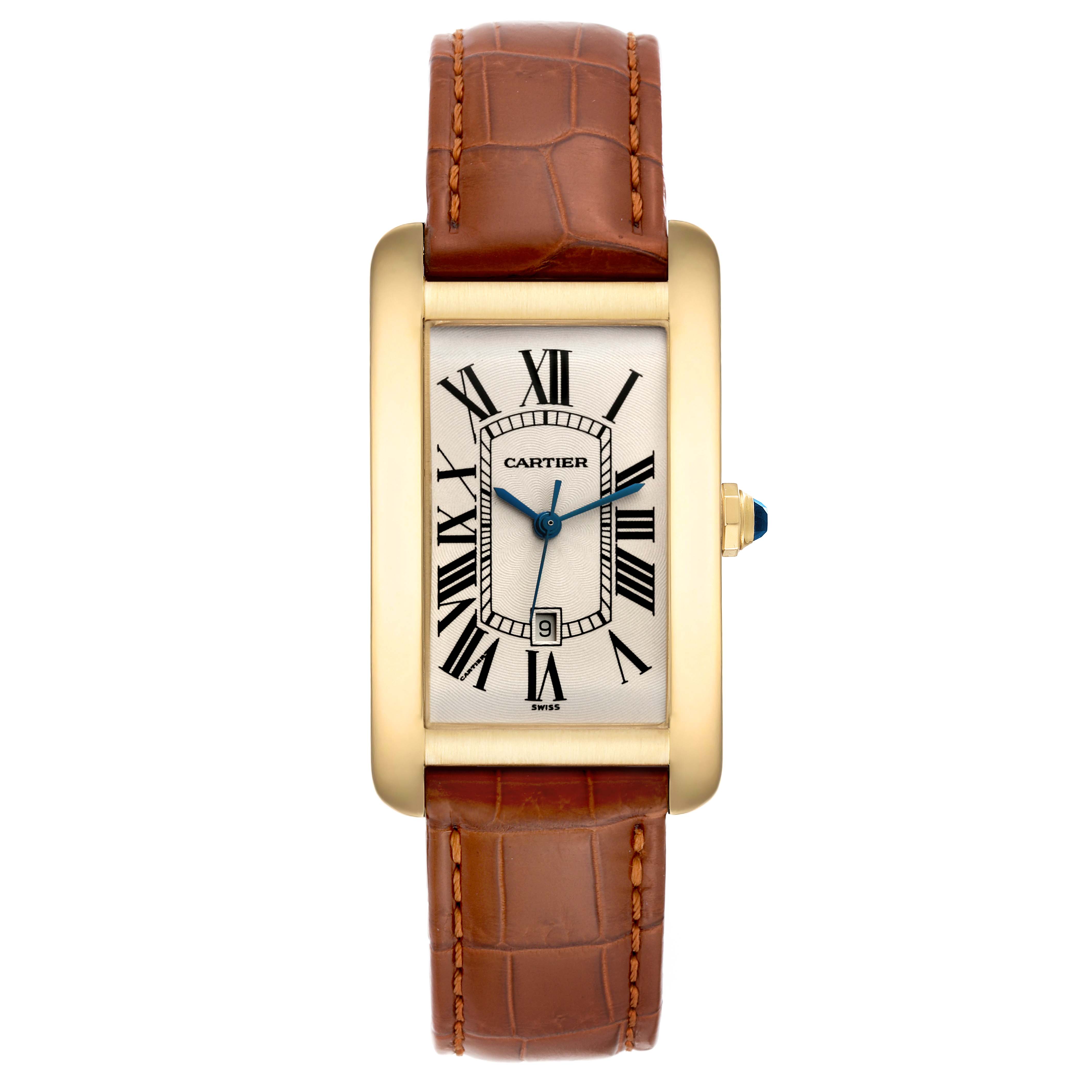 The image shows a Cartier Tank Americaine W2603156 Men's Yellow Gold Silver Dial W2603156 Men's Yellow Gold Silver Dial watch from a top-down angle, featuring its gold rectangular case, Roman numerals, and brown leather strap.