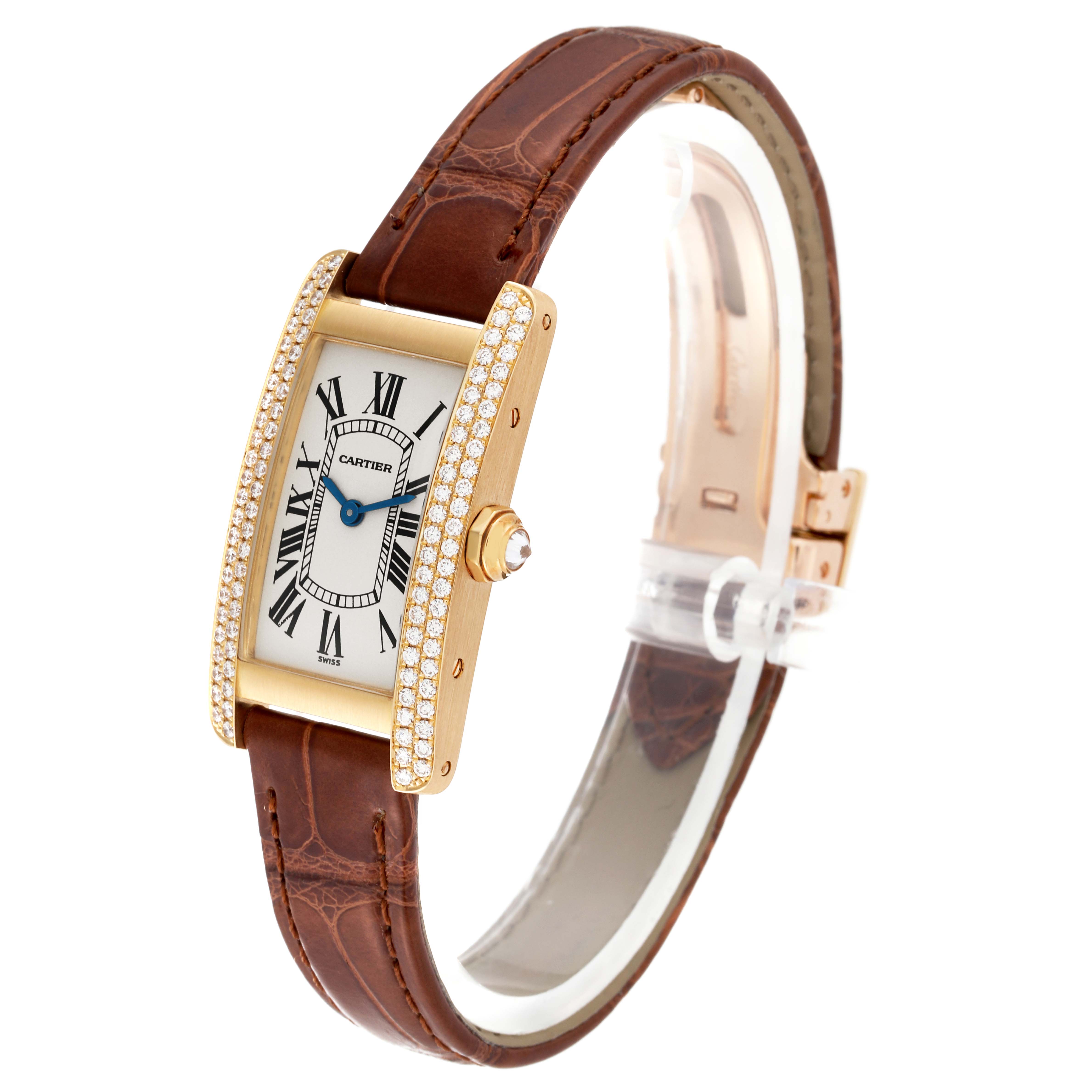 This Cartier Tank Americaine WB701251 Women's Yellow Gold Silver Dial WB701251 Women's Yellow Gold Silver Dial watch is shown at a slight angle, displaying its rectangular face, leather strap, and diamond-set bezel.