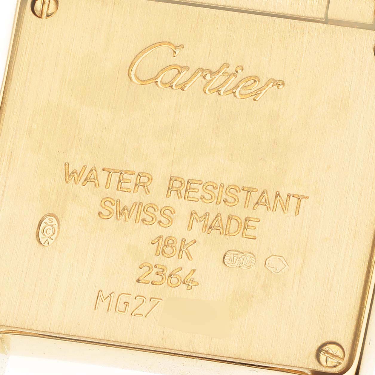 This image shows the back case of a Cartier Tank Francaise WE1001R8 Women
s Yellow Gold Silver Dial WE1001R8 Women
s Yellow Gold Silver Dial watch, detailing its water resistance, material, and serial number.