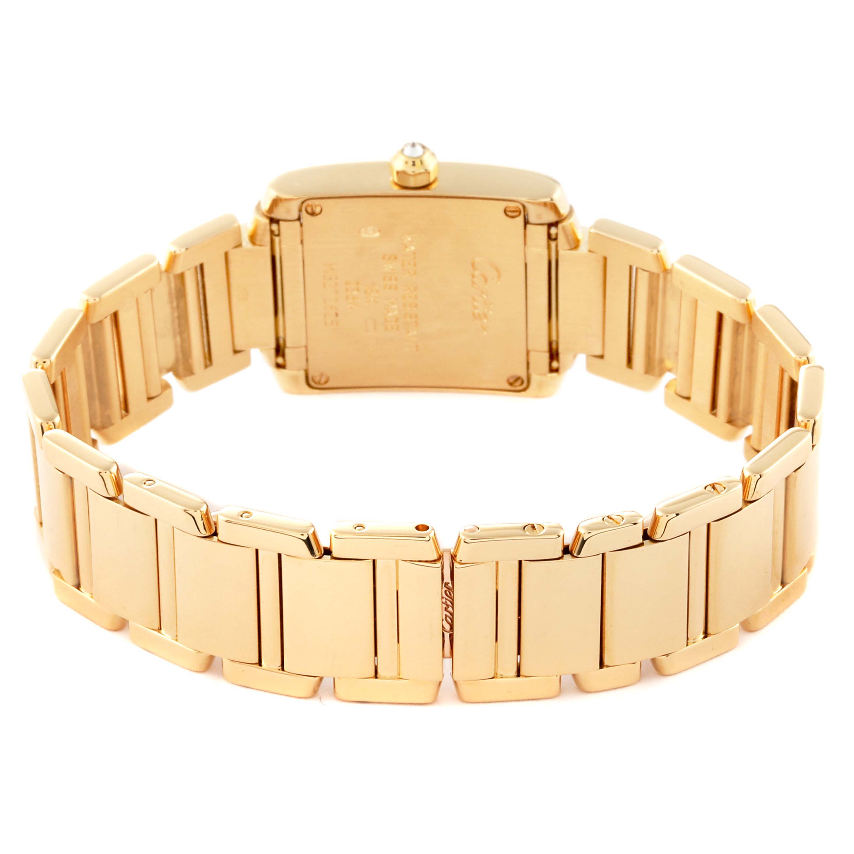 The Cartier Tank Francaise WE1001R8 Women
s Yellow Gold Silver Dial WE1001R8 Women
s Yellow Gold Silver Dial watch is shown from the back, displaying its case back and bracelet.