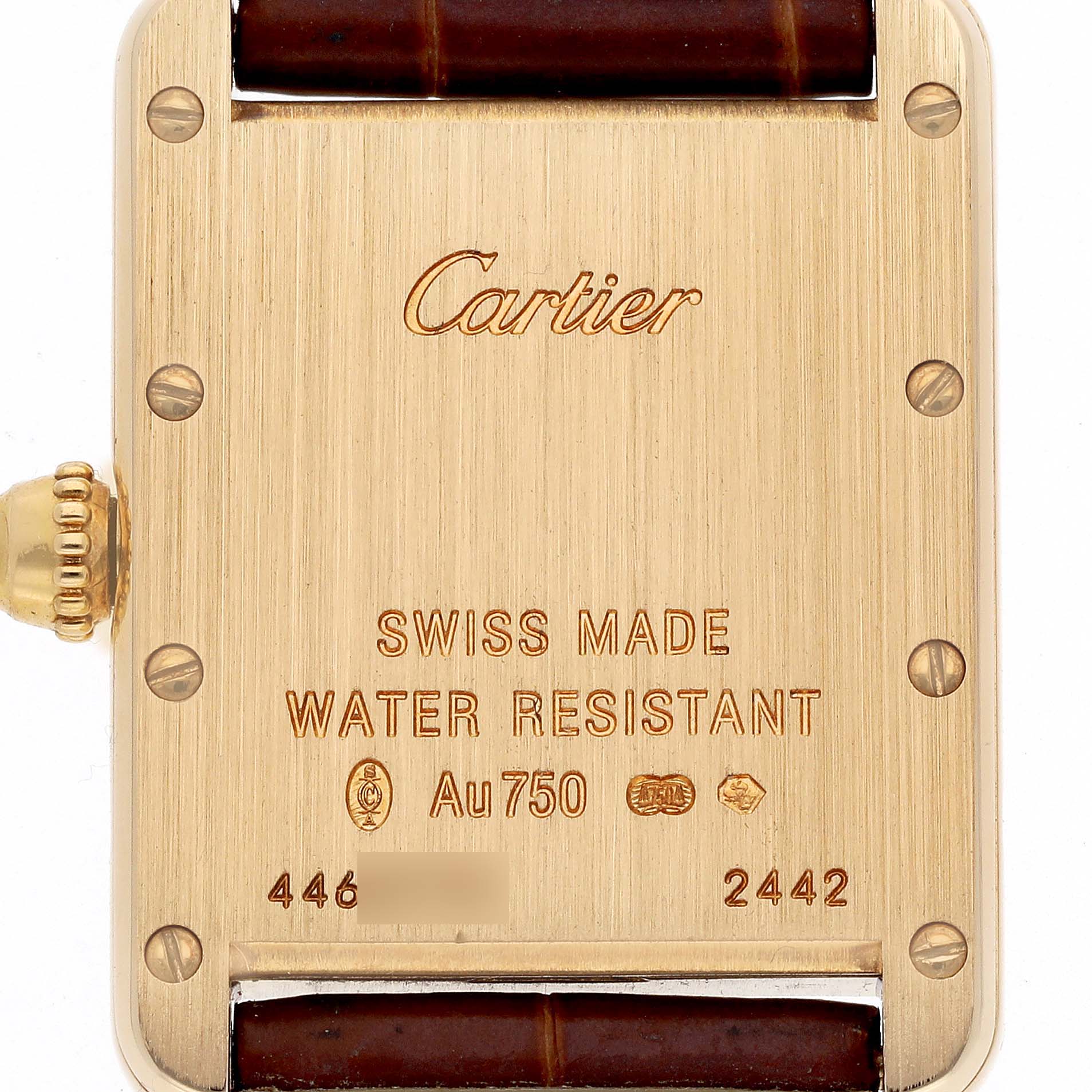 This image shows the back of a Cartier Tank Louis W1529856 Women's Yellow Gold Silver Dial W1529856 Women's Yellow Gold Silver Dial watch with inscriptions and part of the leather strap visible.