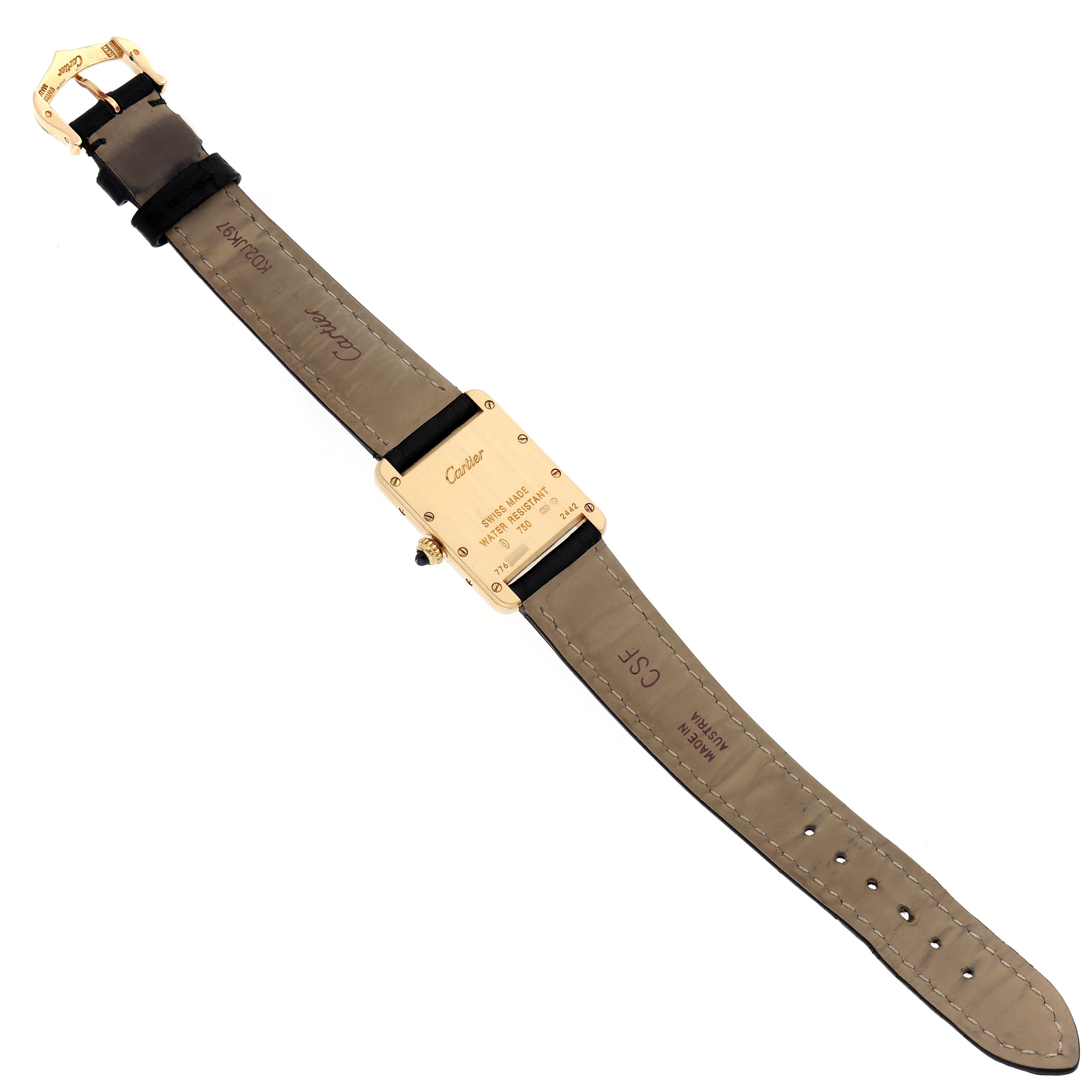 The Cartier Tank Louis W1529856 Women
s Yellow Gold Silver Dial W1529856 Women
s Yellow Gold Silver Dial watch is shown from the back, featuring the case, strap, buckle, and inscriptions.