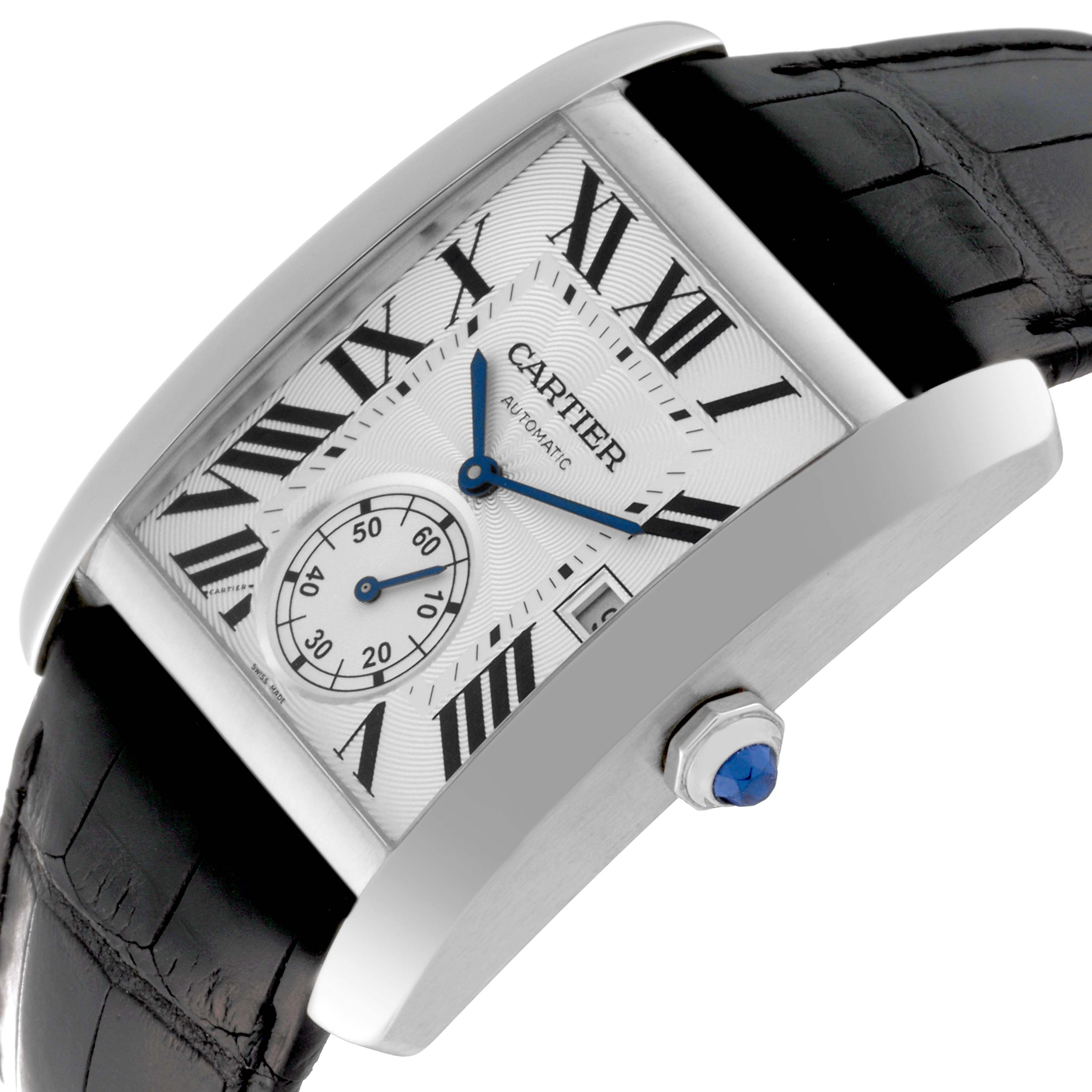 This image shows a Cartier Tank MC W5330003 Men
s Stainless Steel Silver Dial W5330003 Men
s Stainless Steel Silver Dial watch at an angled view, highlighting the face, strap, and crown adorned with a blue gemstone.