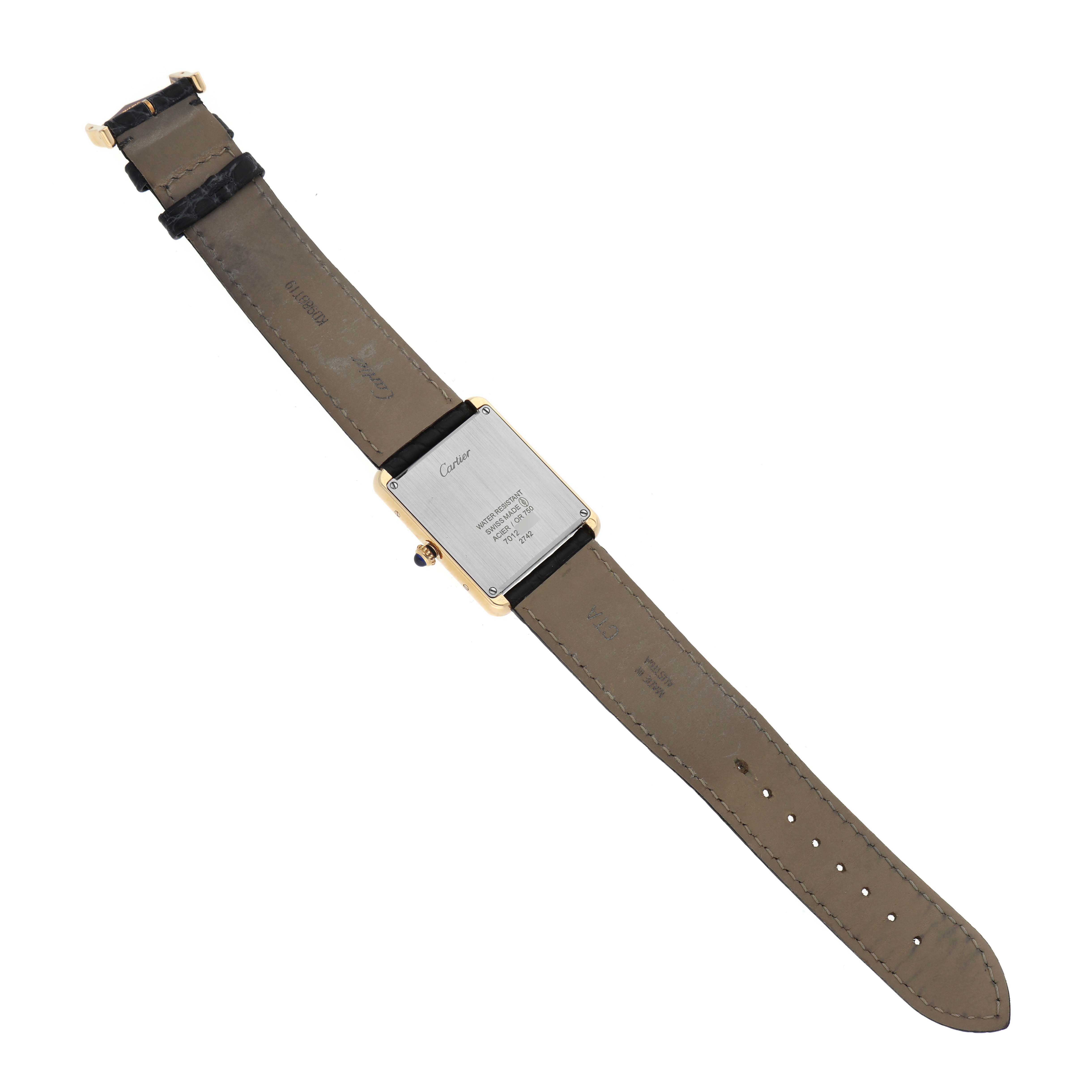 The image shows the back view of a Cartier Tank Solo W1018855 Men's Yellow Gold Silver Dial W1018855 Men's Yellow Gold Silver Dial watch, highlighting the case back and leather strap.