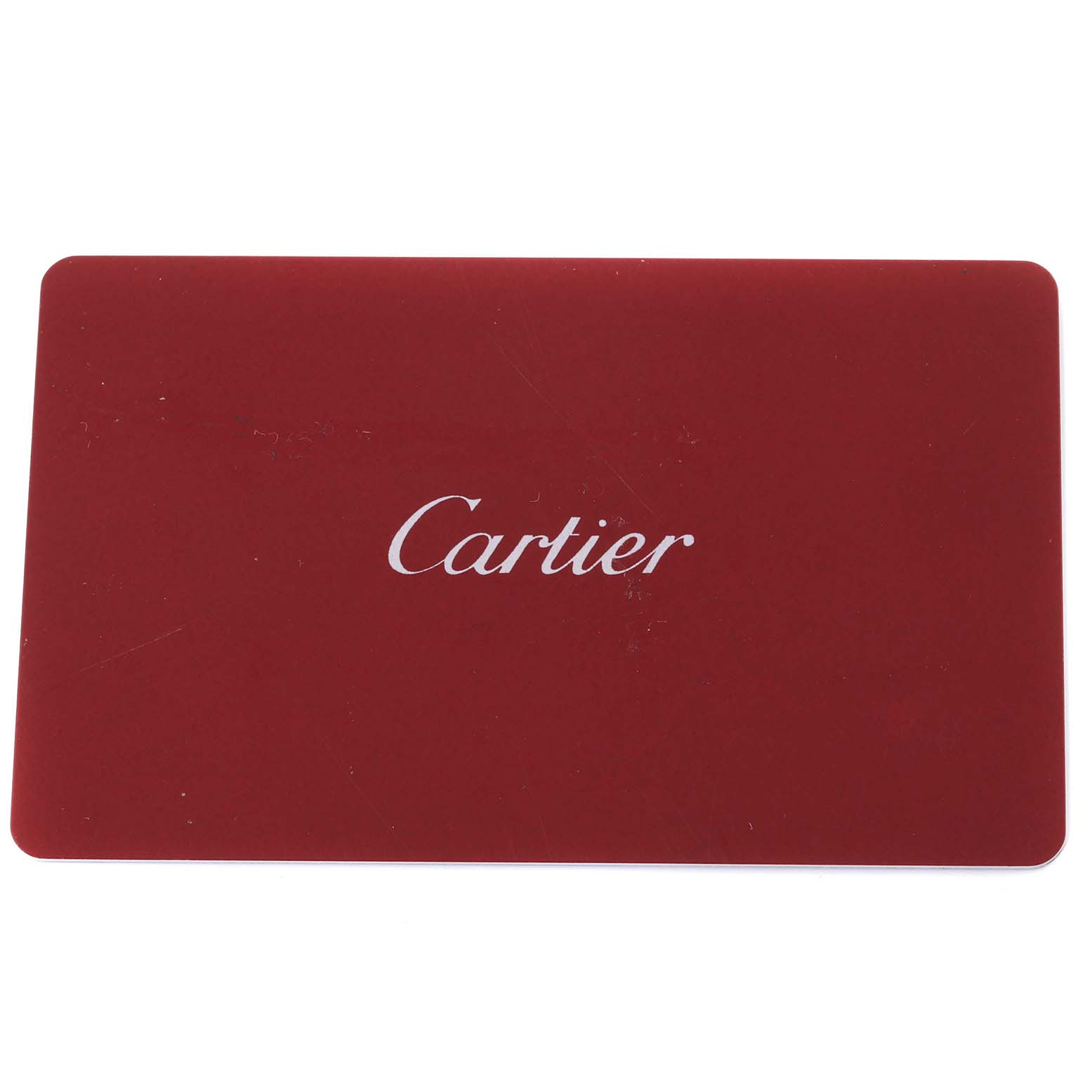 This image shows a red Cartier card, likely an authenticity or warranty card for the Tank Solo model.
