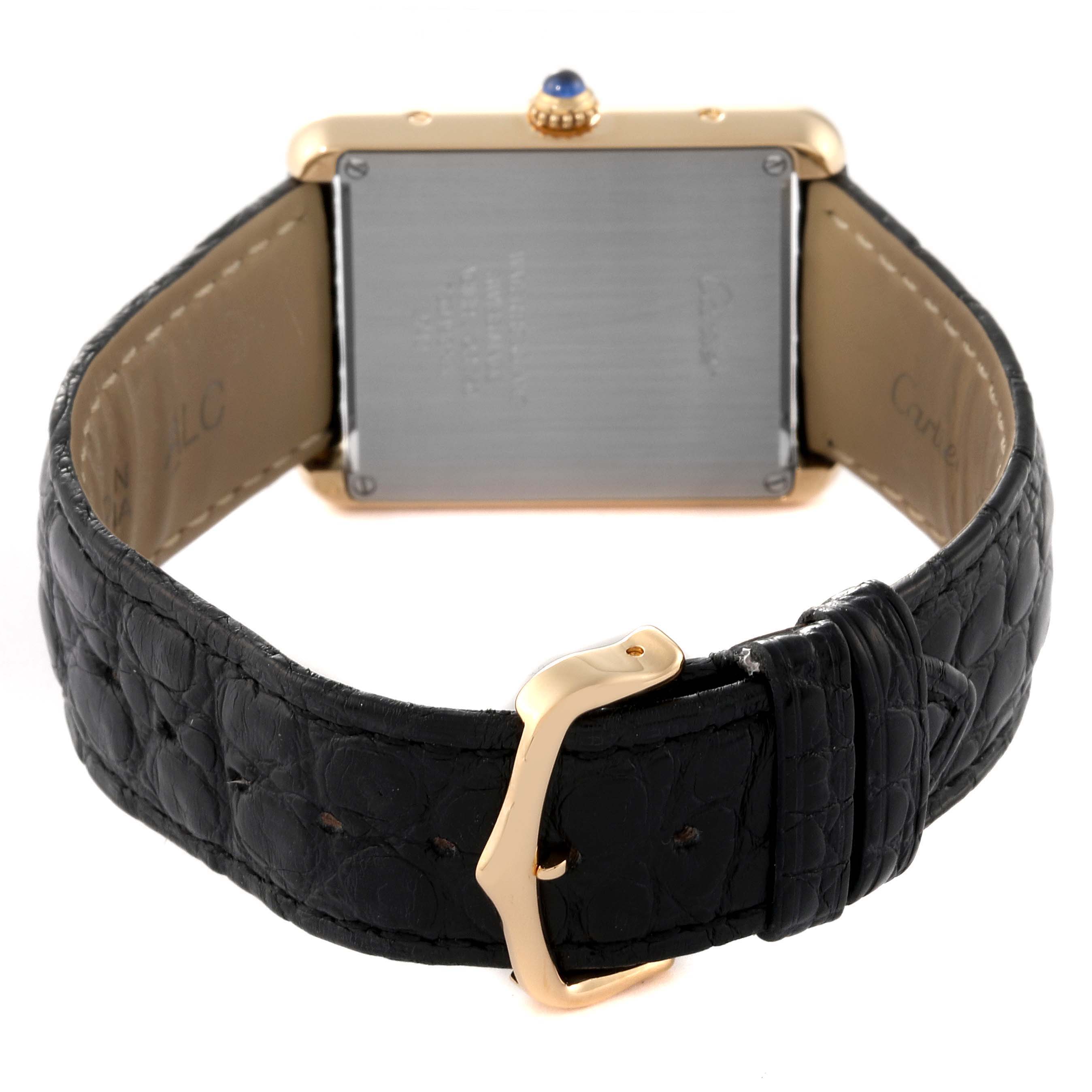 The image shows the back view of a Cartier Tank Solo W1018855 Men's Steel and Gold (two tone) Silver Dial W1018855 Men's Steel and Gold (two tone) Silver Dial watch with a black leather strap and gold buckle.