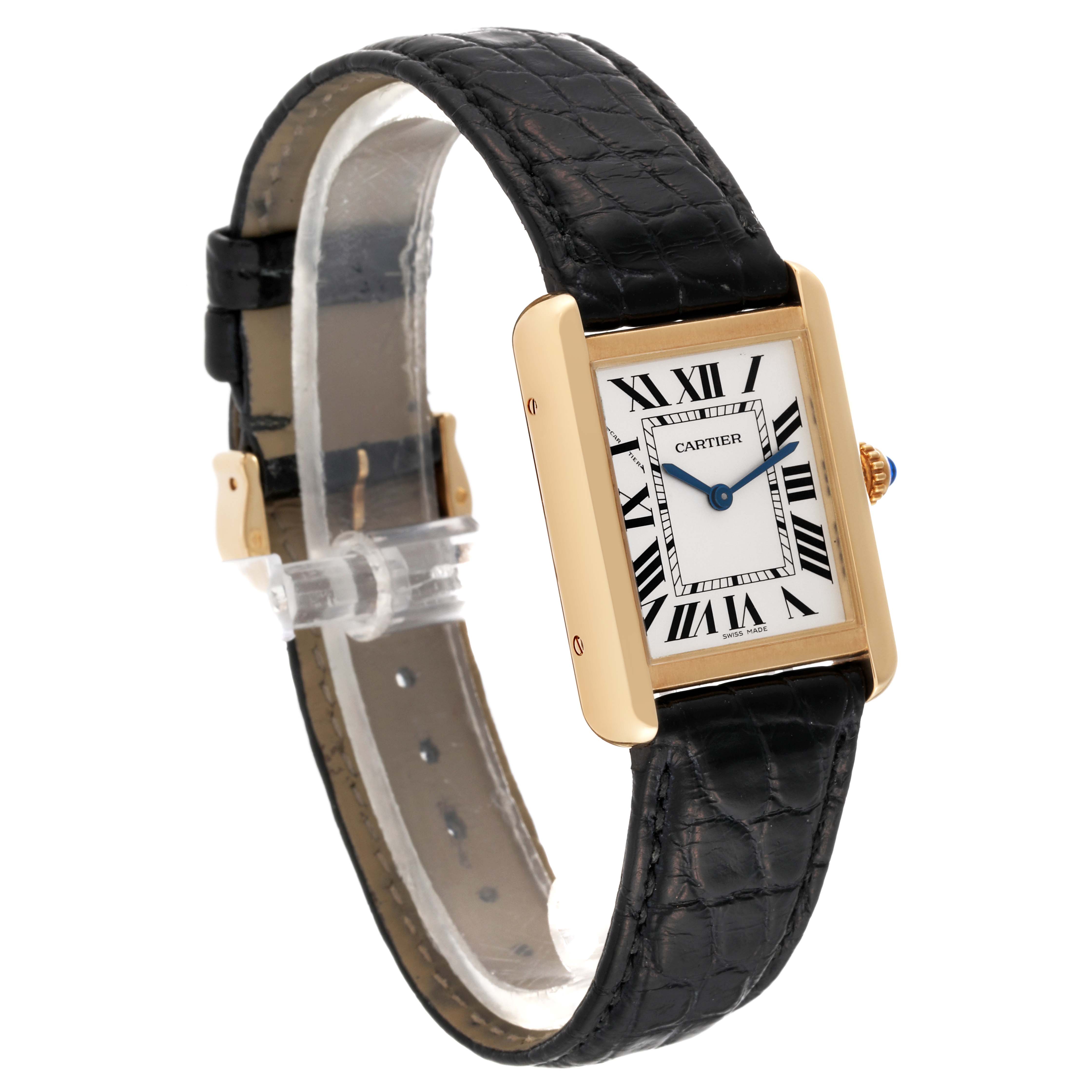 The Cartier Tank Solo W5200002 Women
s Yellow Gold Silver Dial W5200002 Women
s Yellow Gold Silver Dial watch is shown at a three-quarter angle, featuring its rectangular face, black leather strap, and gold casing.