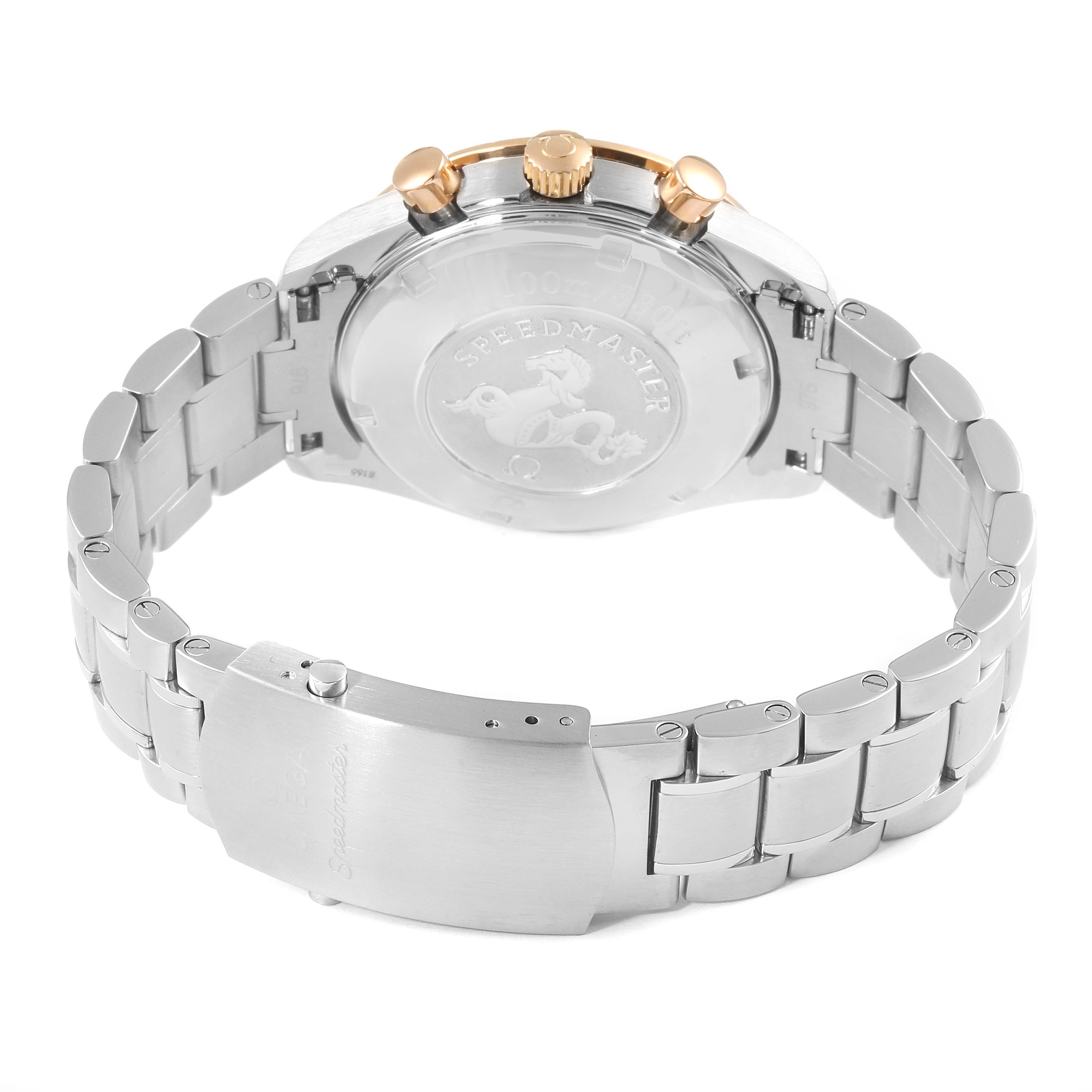 The image shows the back case, bracelet, and clasp of an Omega Speedmaster 323.21.40.40.01.001 Men's Steel and Gold (two tone) Black Dial 323.21.40.40.01.001 Men's Steel and Gold (two tone) Black Dial watch from a rear angle.