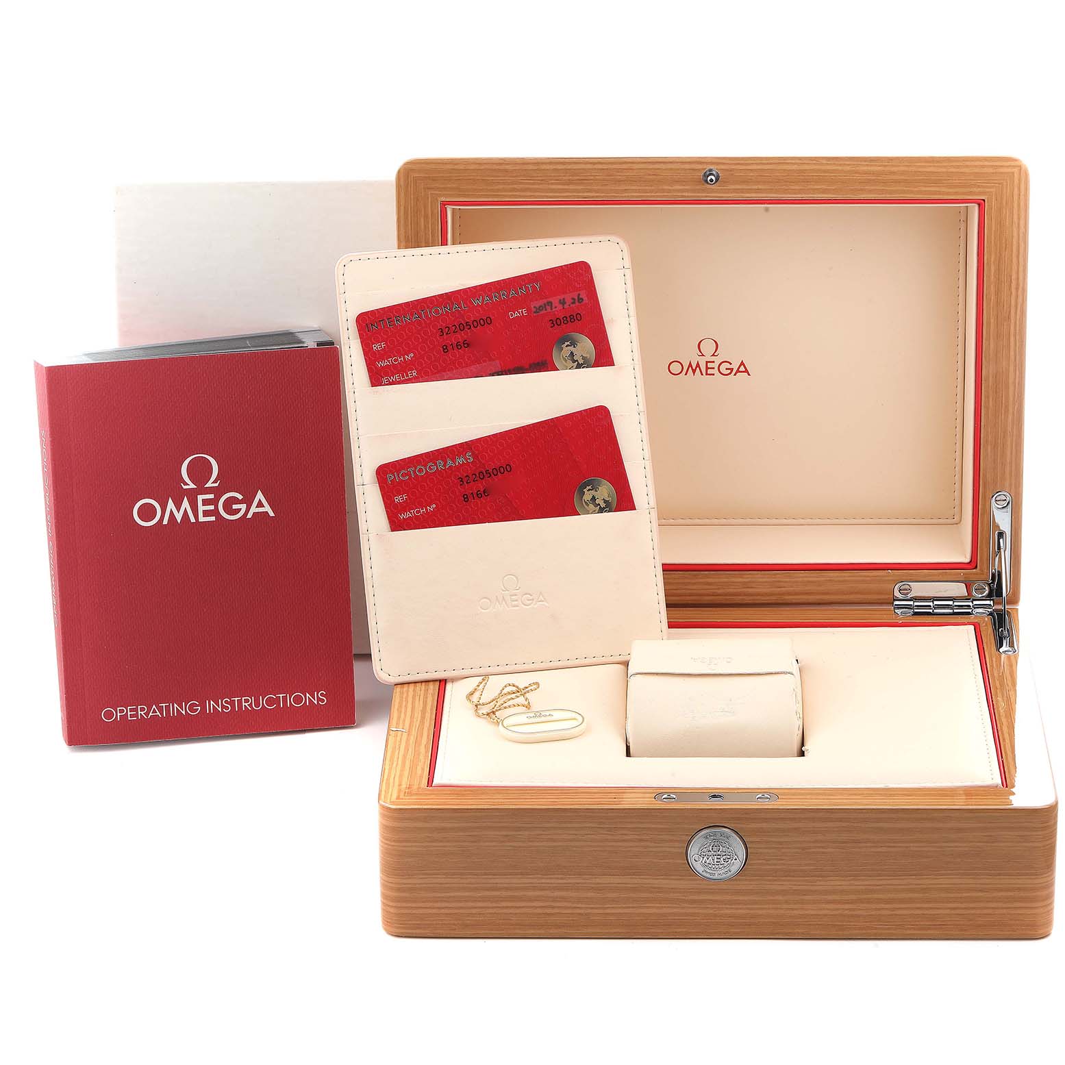 The image shows an Omega Speedmaster 3220.50.00 Men
s Stainless Steel Black Dial 3220.50.00 Men
s Stainless Steel Black Dial box set with operating instructions and warranty cards.