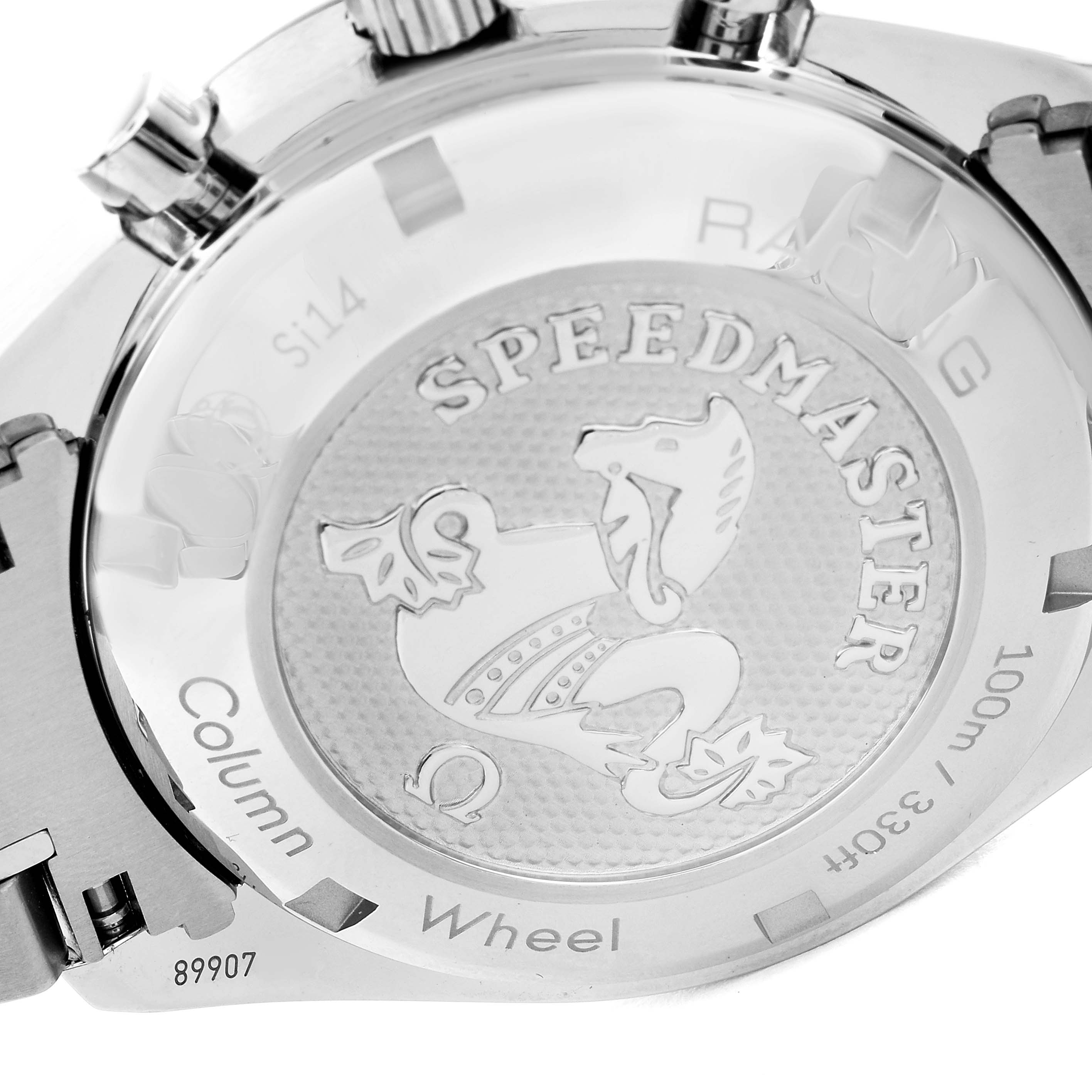 The image shows the back case of an Omega Speedmaster 326.30.40.50.01.002 Men
s Stainless Steel Black Dial 326.30.40.50.01.002 Men
s Stainless Steel Black Dial watch, featuring engraved branding and design details, viewed from a straight angle.