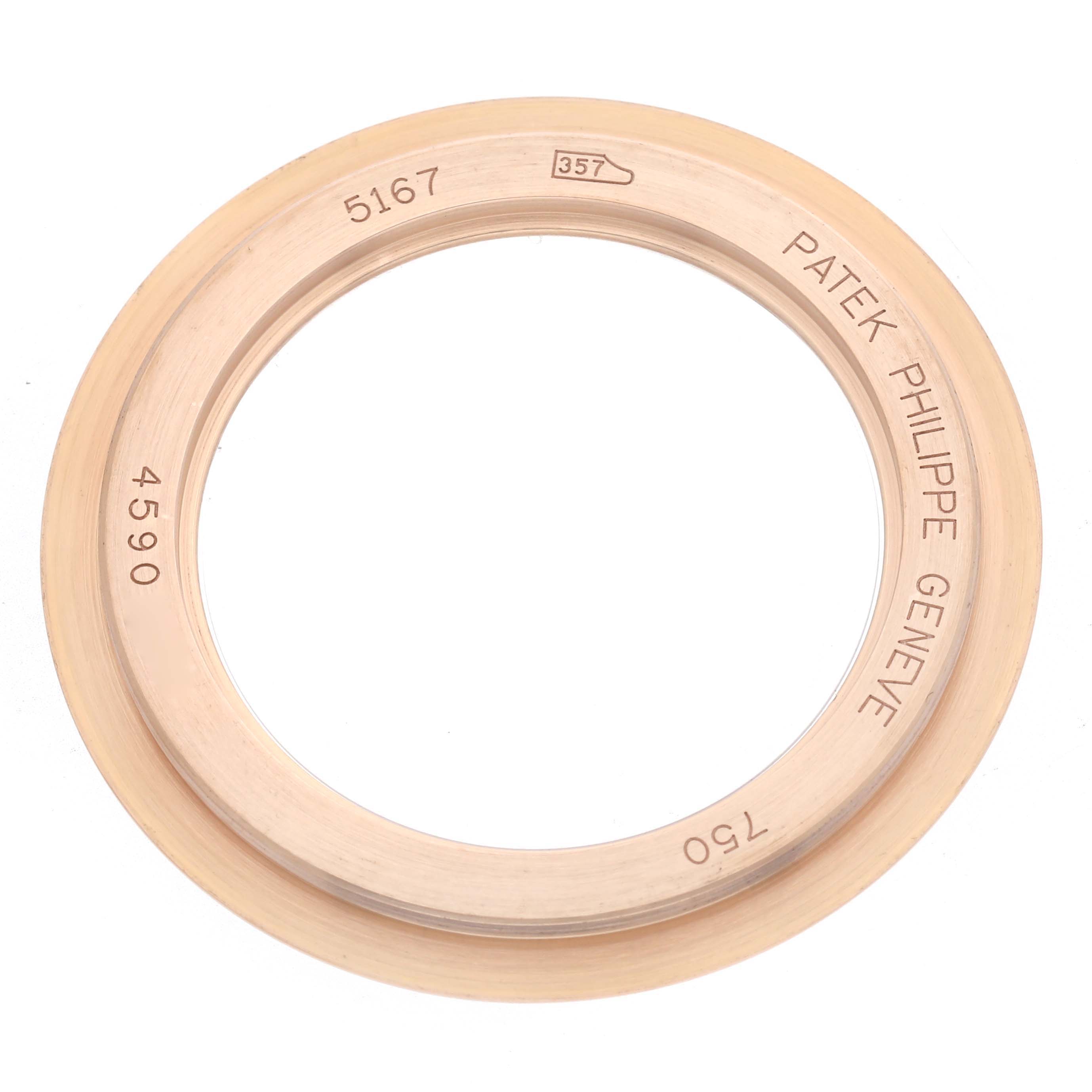 The image shows a Patek Philippe Aquanaut 5167R-001 Men
s Rose Gold Brown Dial 5167R-001 Men
s Rose Gold Brown Dial watch bezel from a top-down angle.