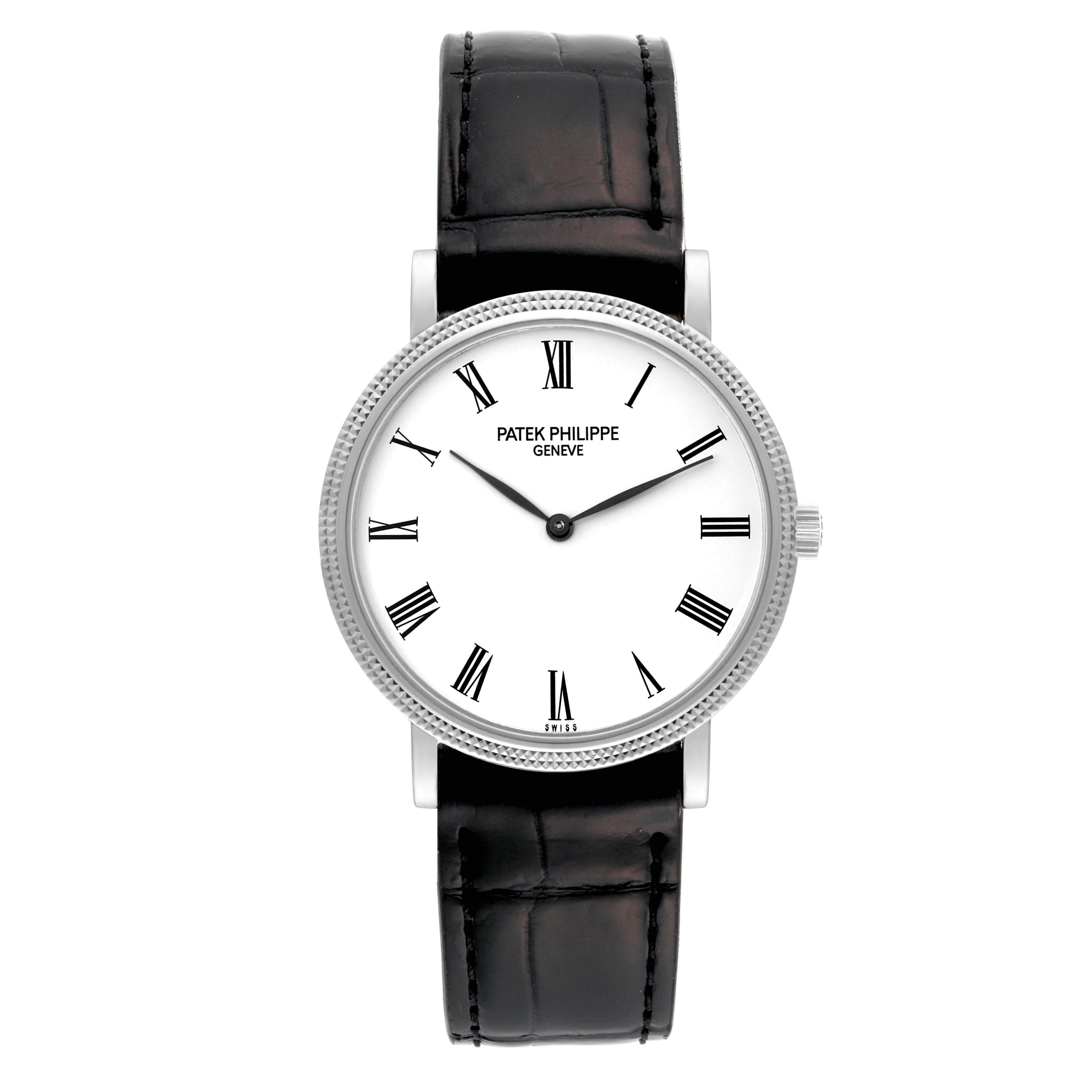 The image shows a front view of a Patek Philippe Calatrava 5120 Men
s White Gold White Dial 5120 Men
s White Gold White Dial watch with a white dial, black Roman numerals, and a black leather strap.