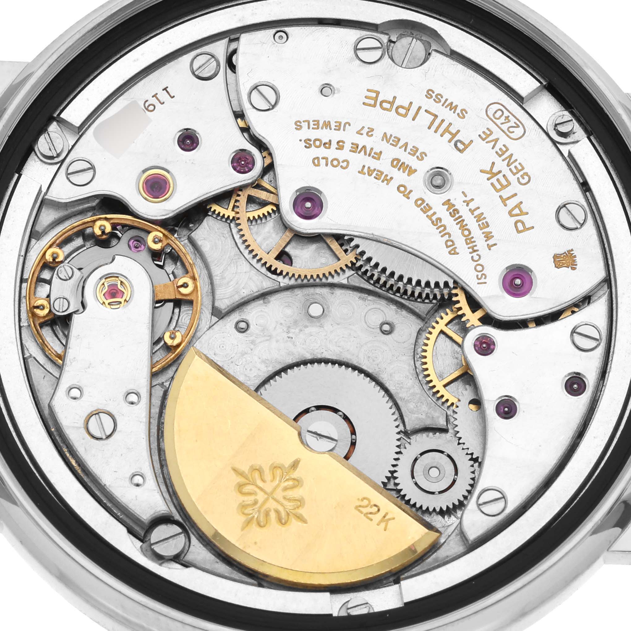 This image shows a close-up of the movement mechanism of a Patek Philippe Calatrava 5120 Men
s White Gold White Dial 5120 Men
s White Gold White Dial watch.