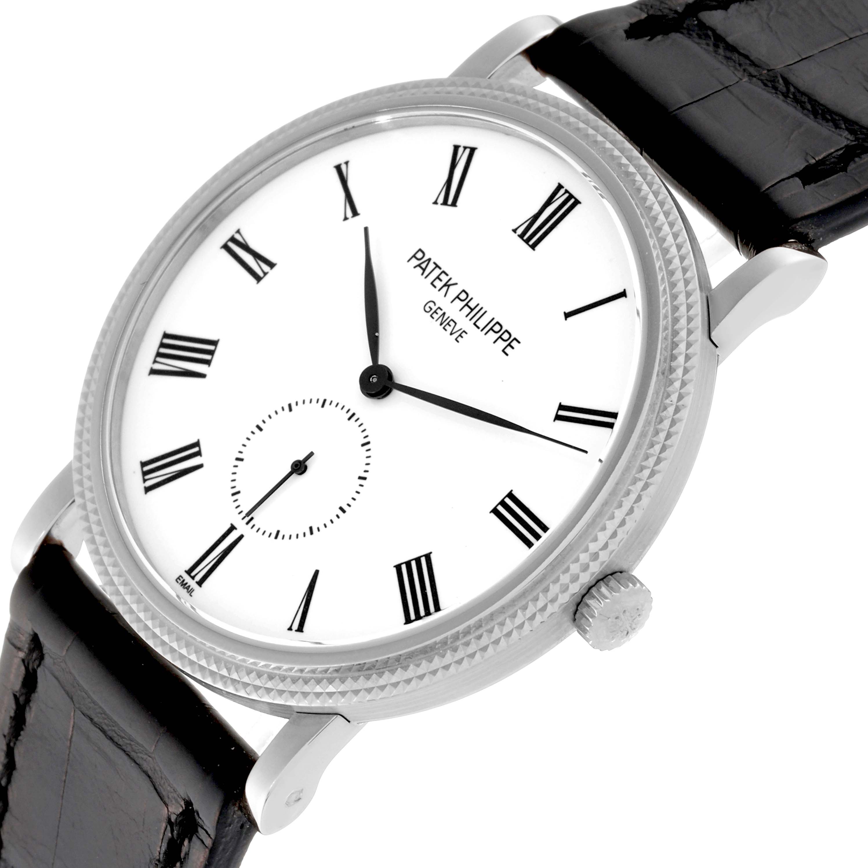 This image shows a Patek Philippe Calatrava 5116G Men
s White Gold White Dial 5116G Men
s White Gold White Dial watch at a slight angle, highlighting the dial, crown, and strap.