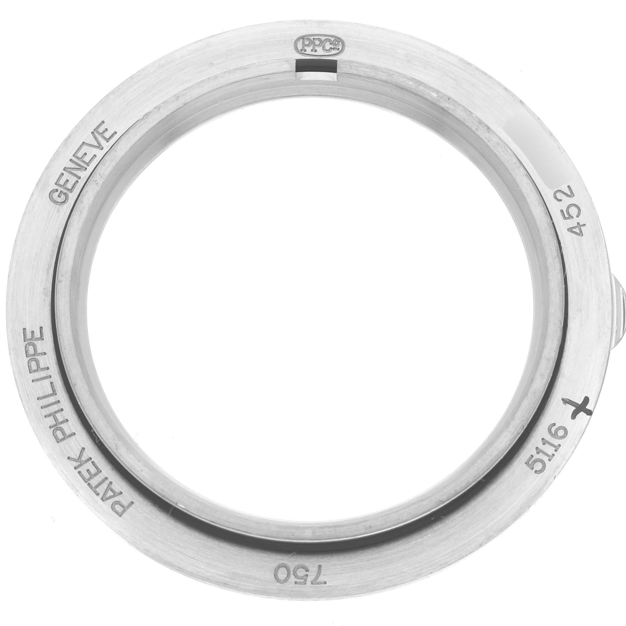 This is a close-up view of the bezel of a Patek Philippe Calatrava 5116G Men
s White Gold White Dial 5116G Men
s White Gold White Dial model watch.