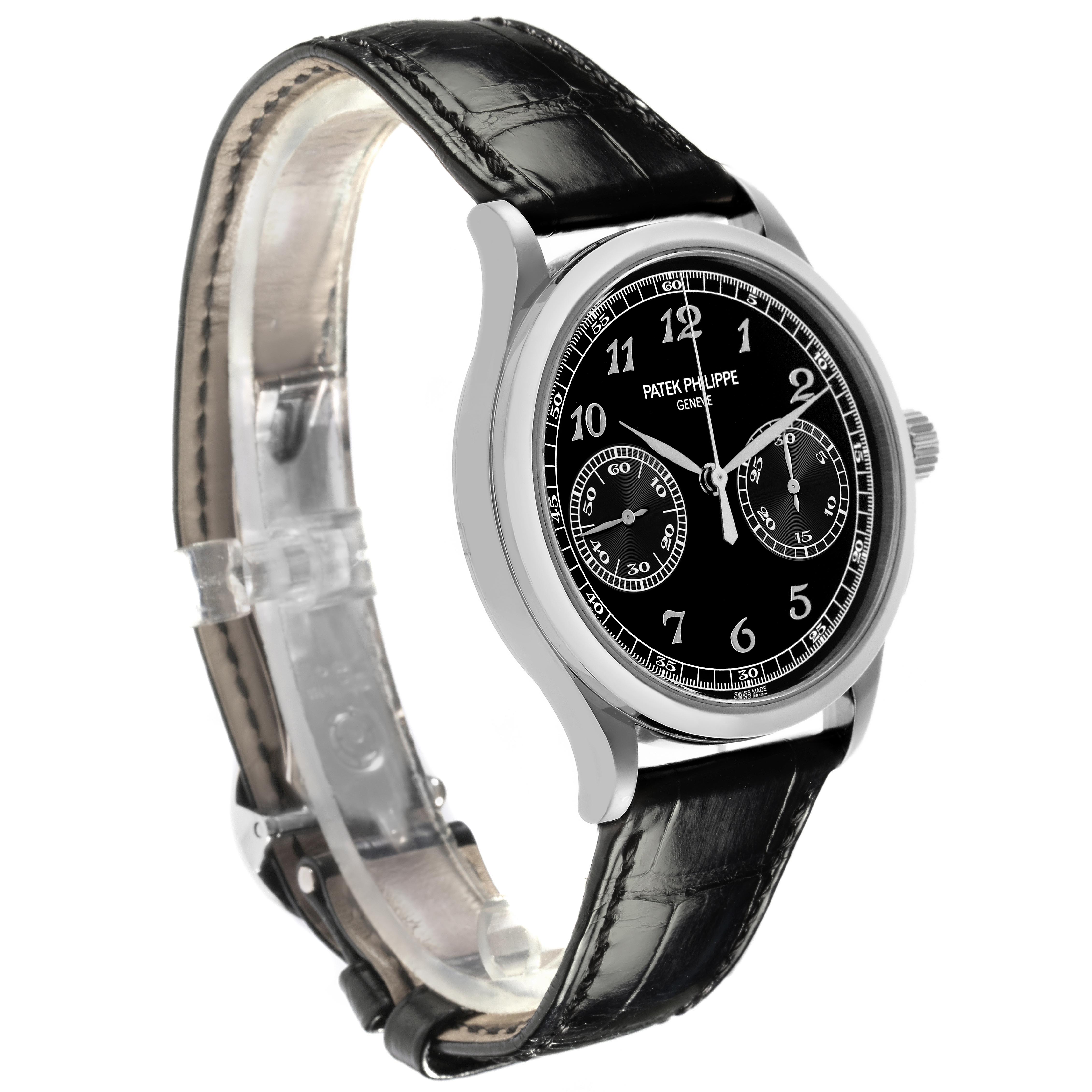 The Patek Philippe Complications 5170G-010 Men
s White Gold Black Dial 5170G-010 Men
s White Gold Black Dial watch is shown at a slight angle, highlighting the face, bezel, case, and leather strap.