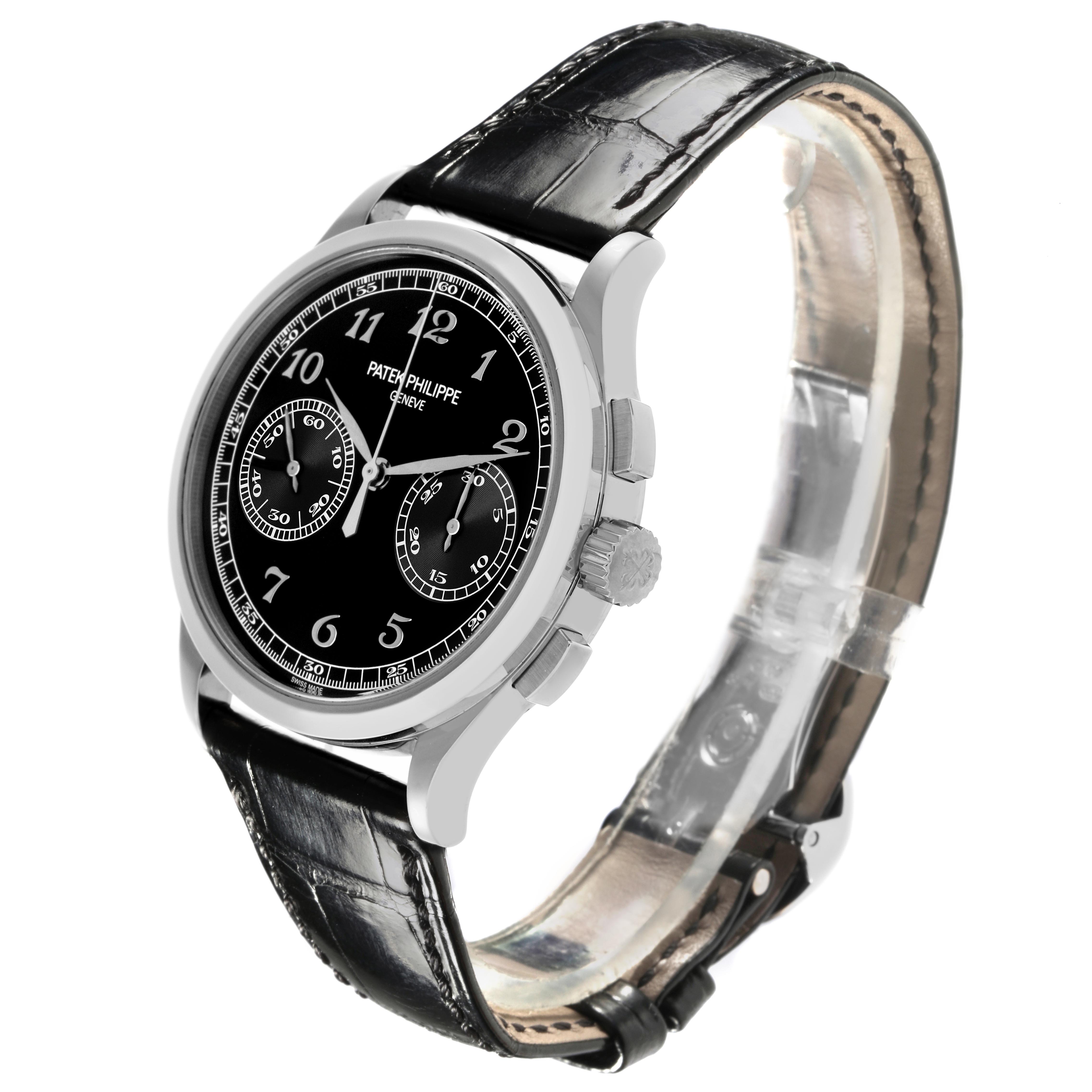 The Patek Philippe Complications 5170G-010 Men
s White Gold Black Dial 5170G-010 Men
s White Gold Black Dial watch is shown at a three-quarter angle, highlighting the face, crown, and leather strap.