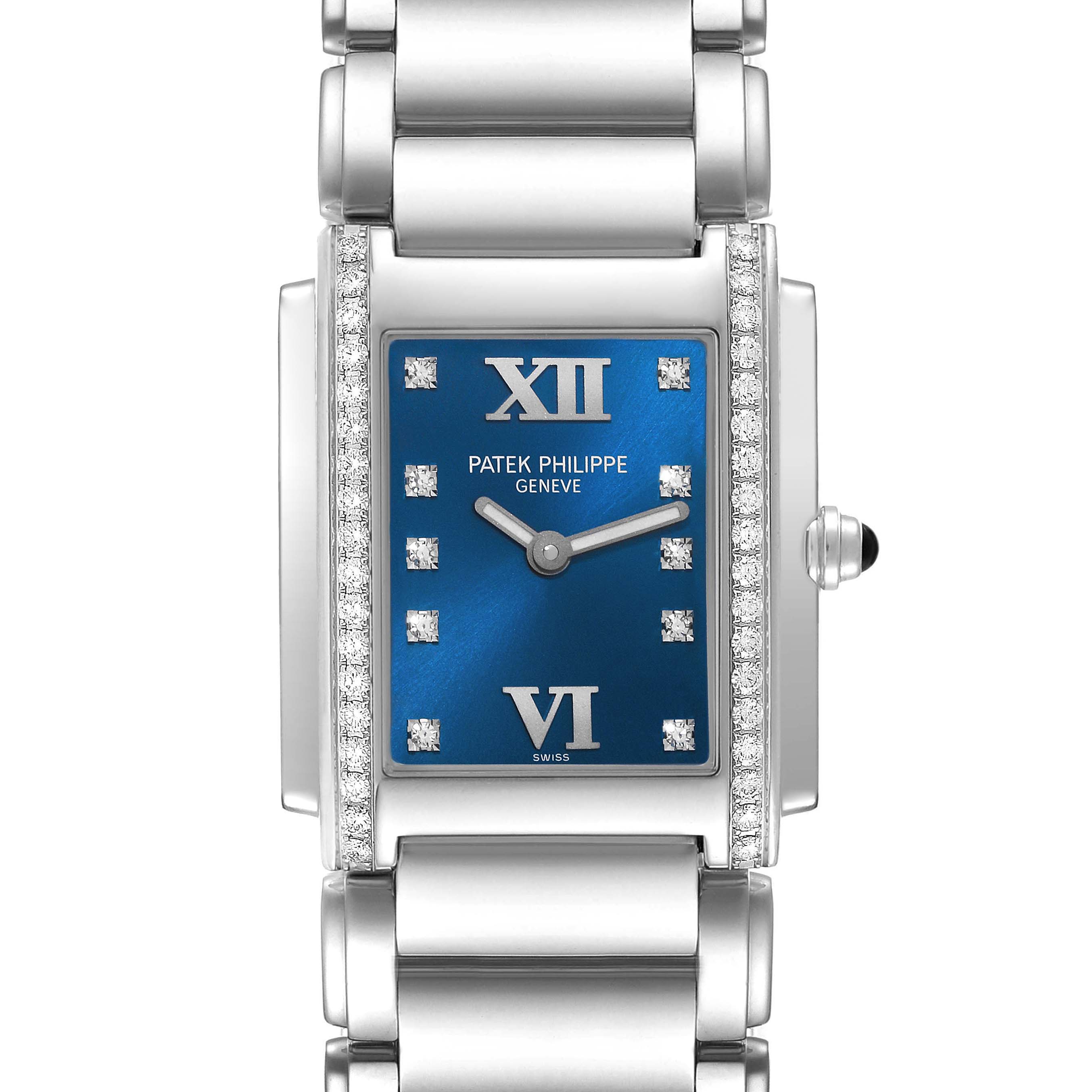 This image shows a front view of the Patek Philippe Twenty-4 4910/10A-012 Women's Stainless Steel Blue Dial 4910/10A-012 Women's Stainless Steel Blue Dial watch, highlighting its blue dial, roman numerals, and metal bracelet.