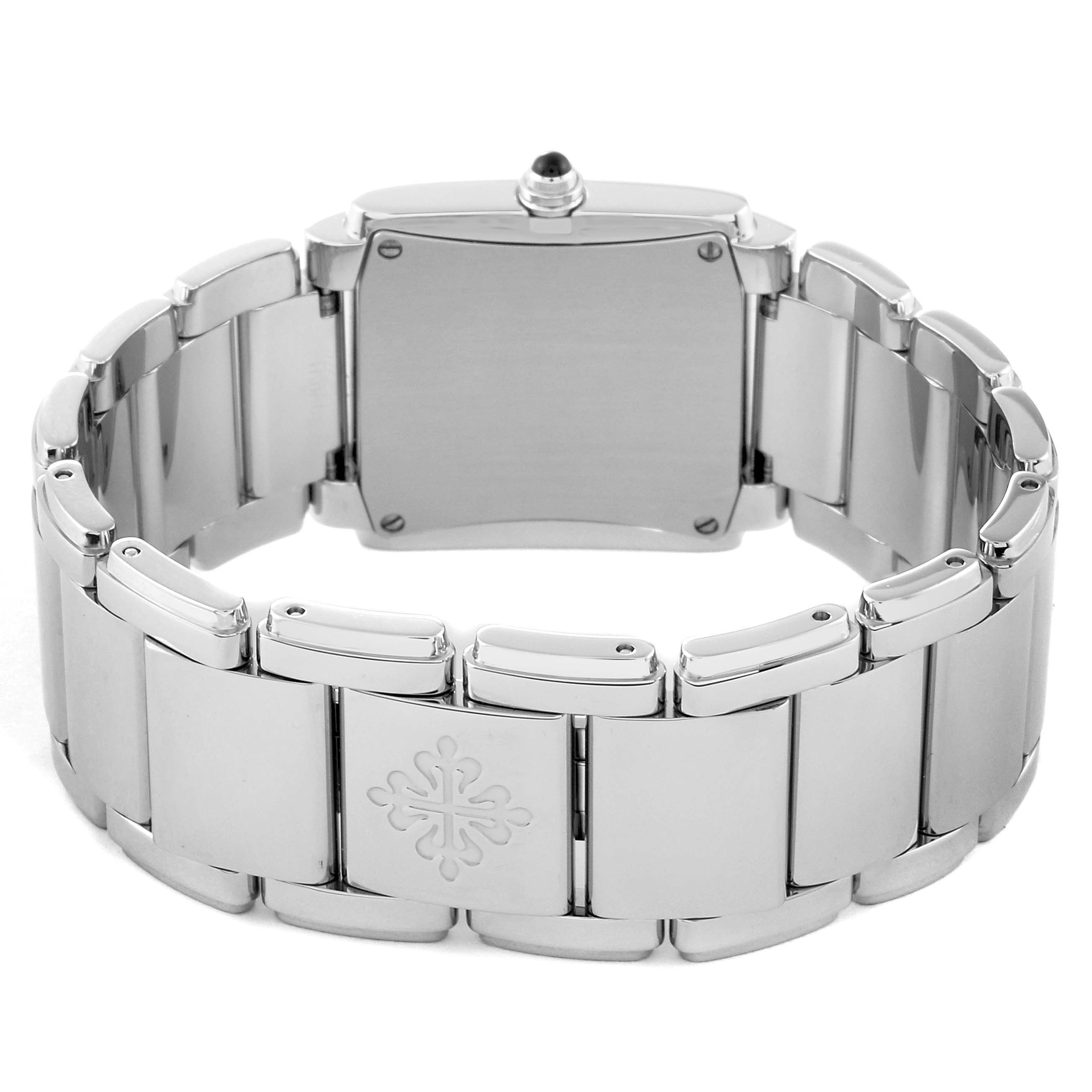 The image shows the back view of a Patek Philippe Twenty-4 4910/10A-012 Women's Stainless Steel Blue Dial 4910/10A-012 Women's Stainless Steel Blue Dial model watch, highlighting its bracelet and case back.