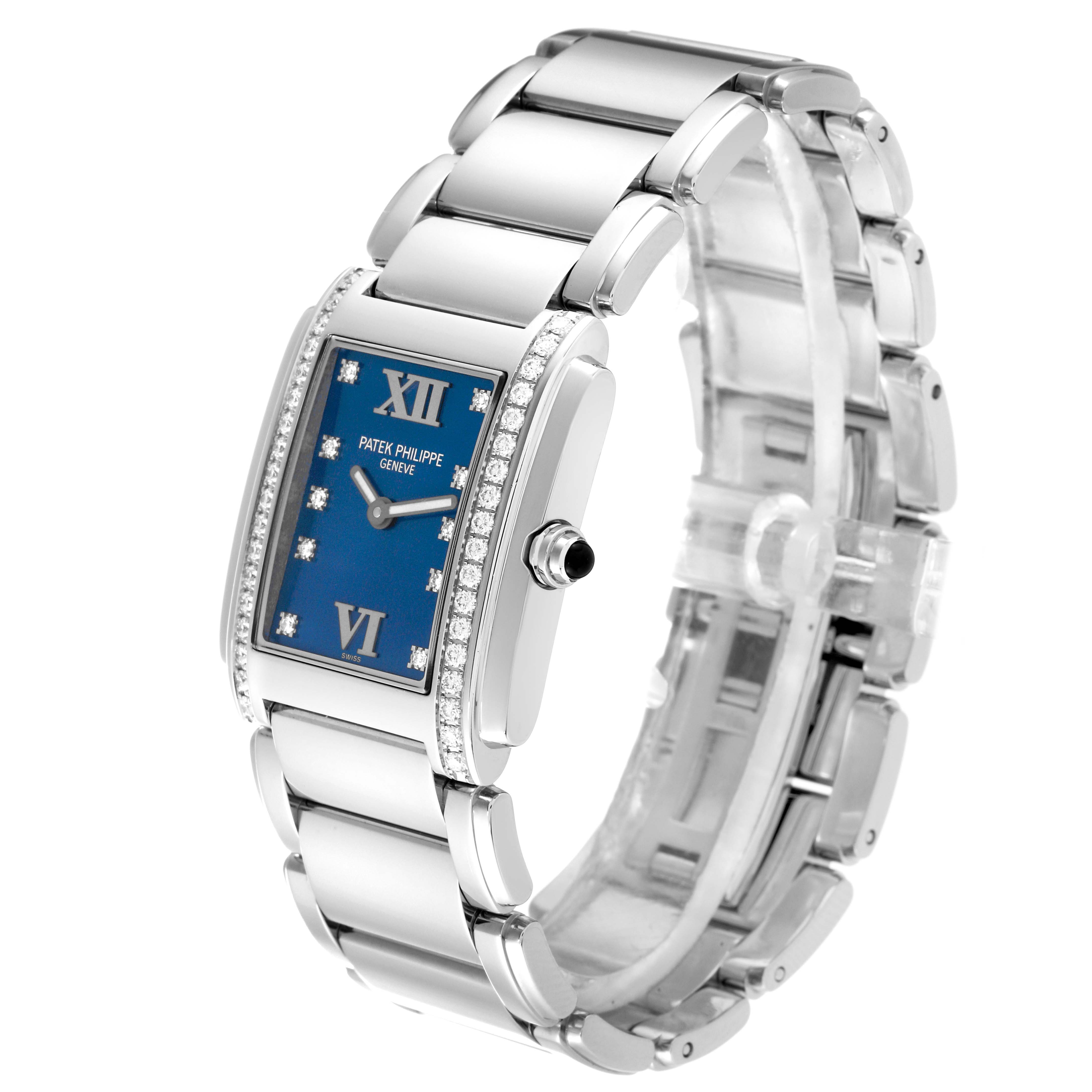 The image shows a Patek Philippe Twenty-4 4910/10A-012 Women's Stainless Steel Blue Dial 4910/10A-012 Women's Stainless Steel Blue Dial watch at a slight angle, highlighting the blue dial, diamond accents, and metal bracelet.