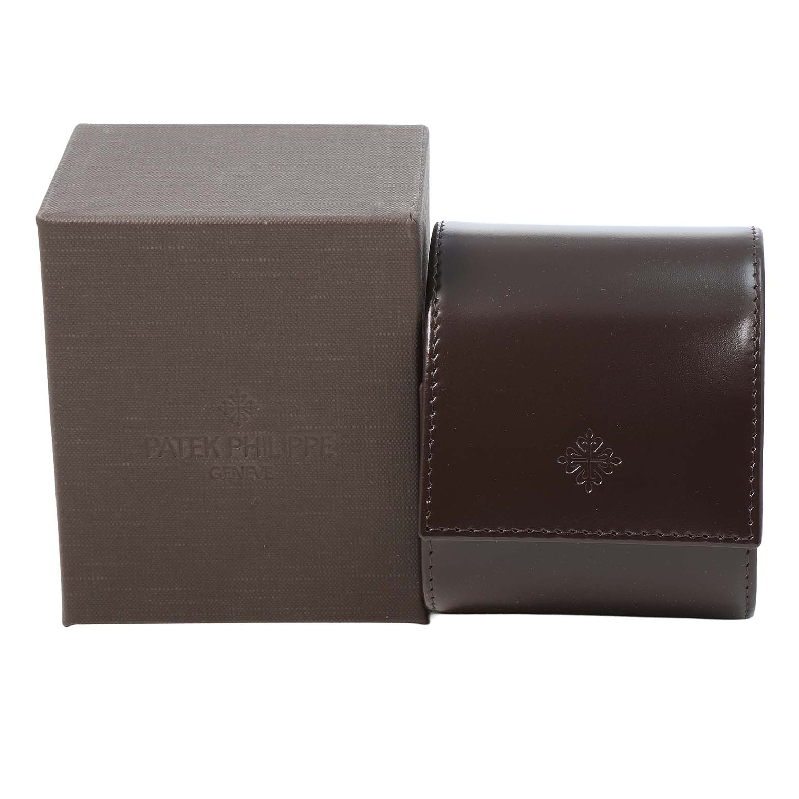 The image shows a Patek Philippe Twenty-4 4910 4910A Women's Stainless Steel Blue Dial model watch box and a leather case from the front angle.