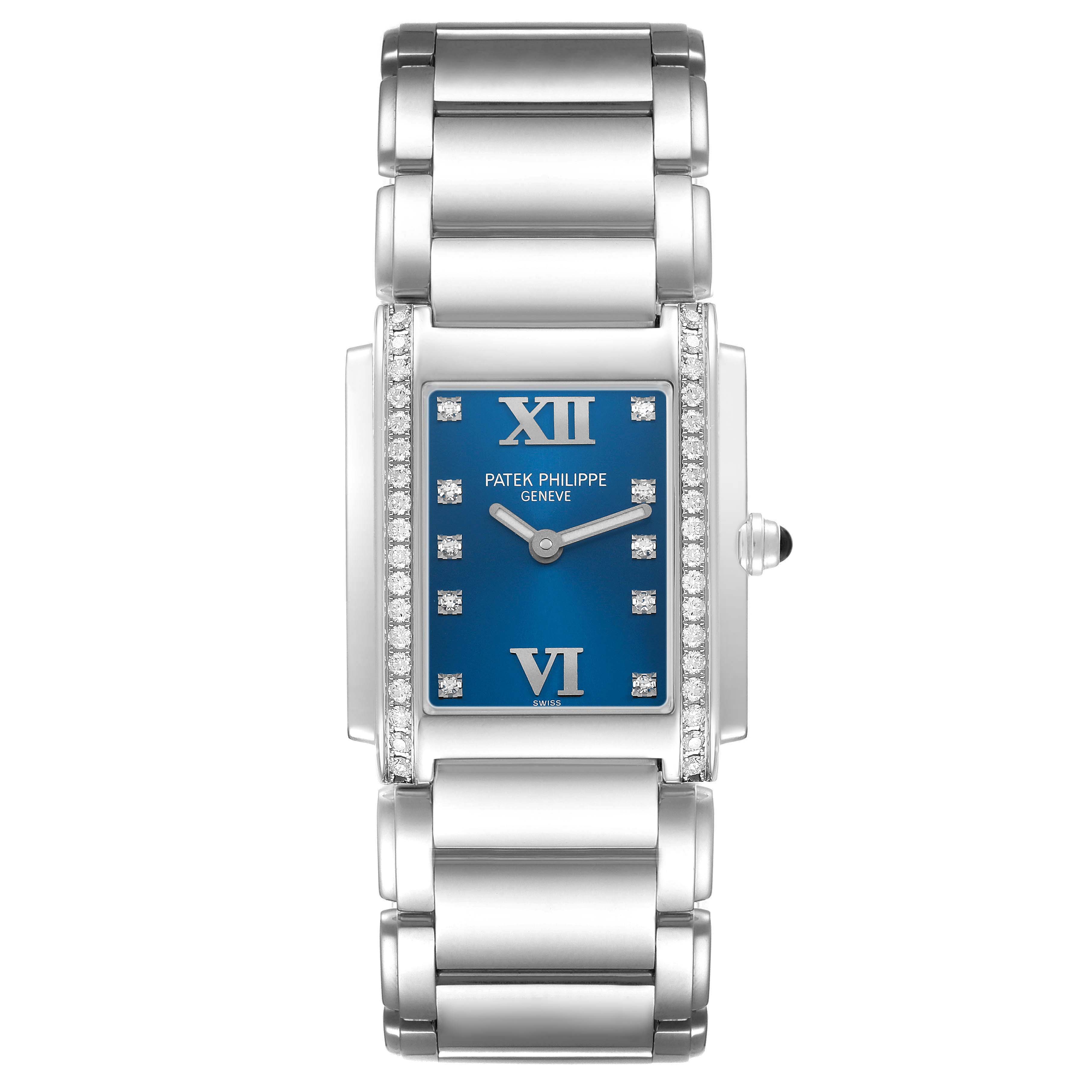 The image shows a front view of the Patek Philippe Twenty-4 4910 4910A Women's Stainless Steel Blue Dial watch, highlighting its blue dial, diamond accents, and metal bracelet.